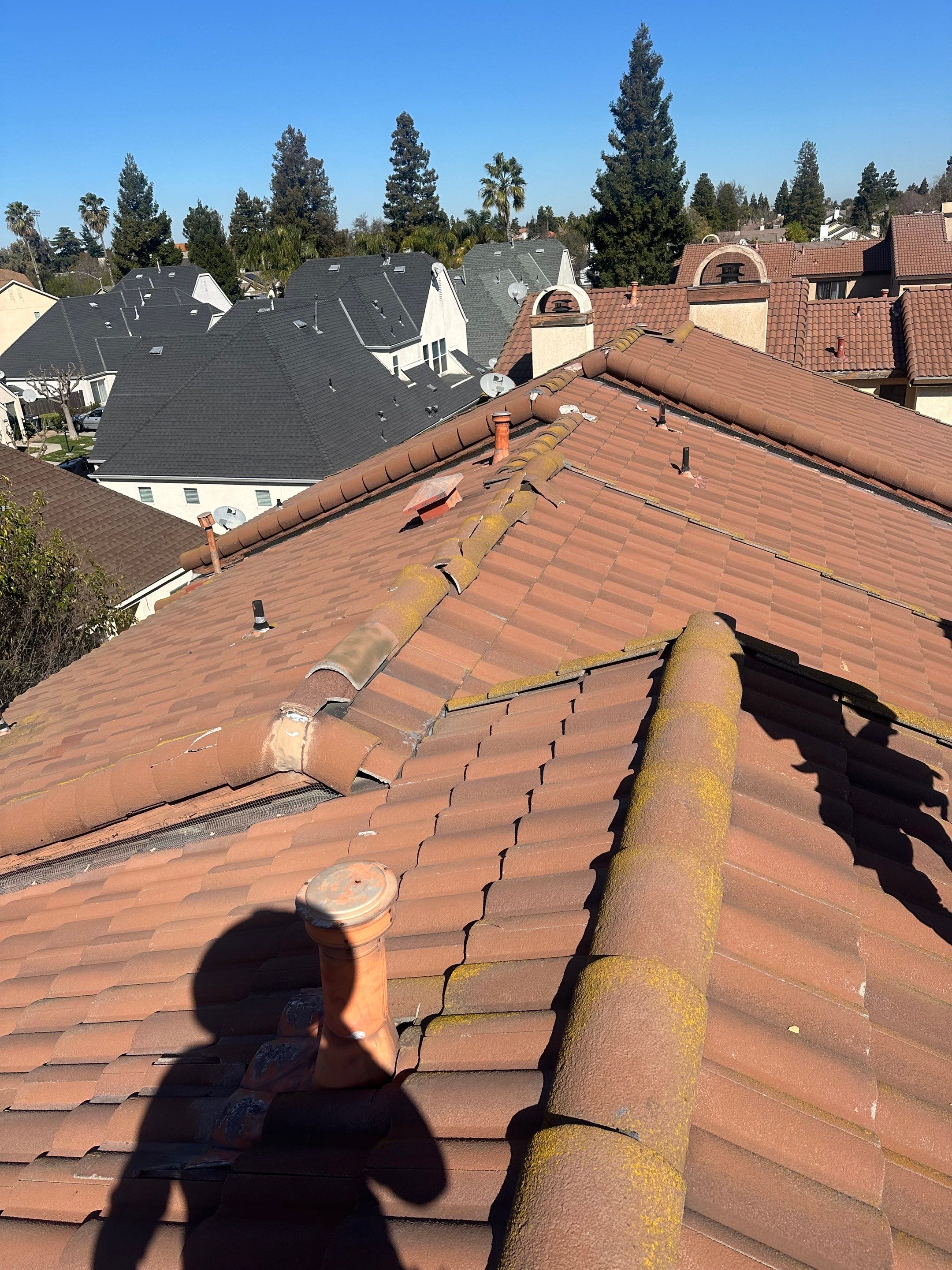 Tile Roof repair by Grandmark Service Company