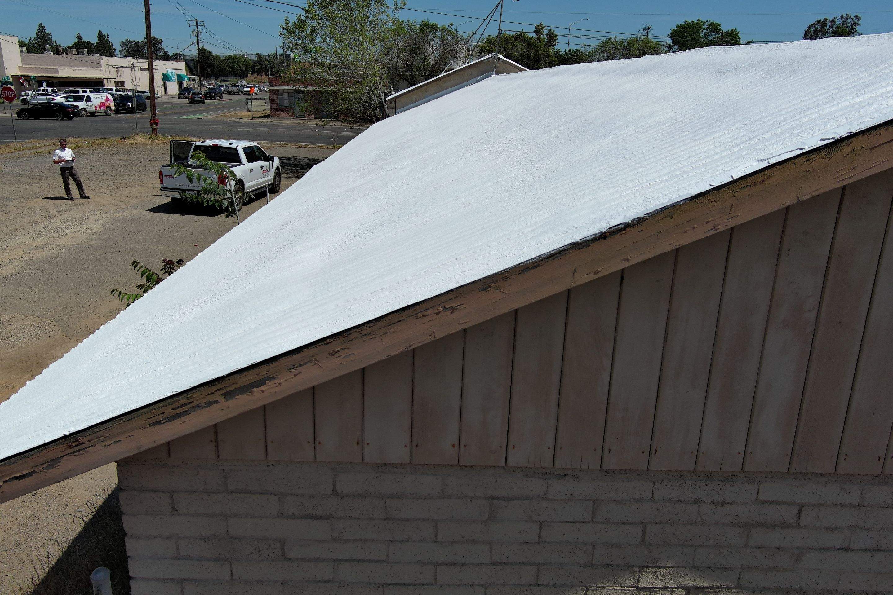 Spray foam and coatings using Conklin Benchmark/PUMA XL by Straight Edge Roofing Inc