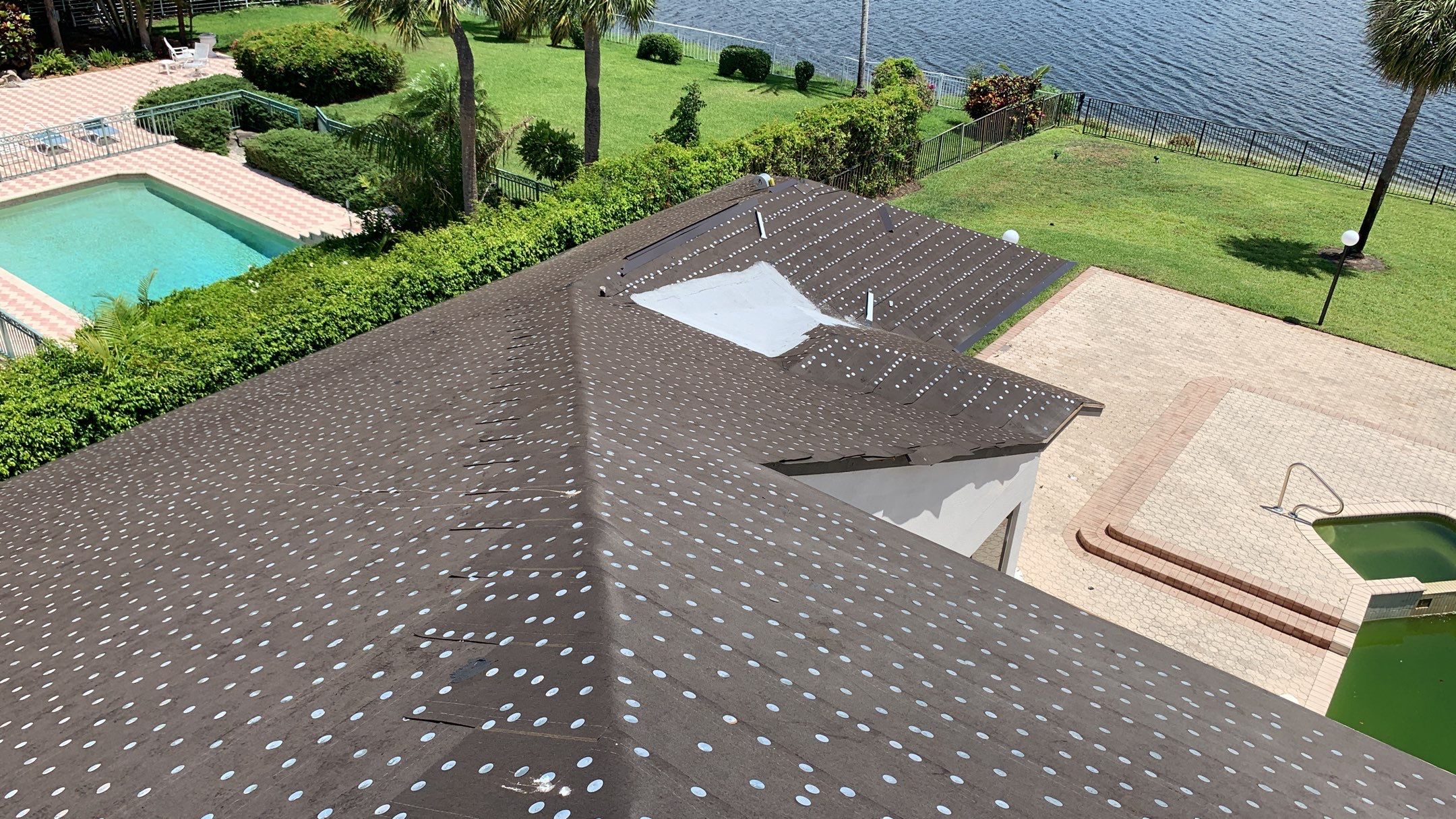 Residential Roofing Installation using 1" Nail strip metal roof by BLUES BROTHERS ROOFING