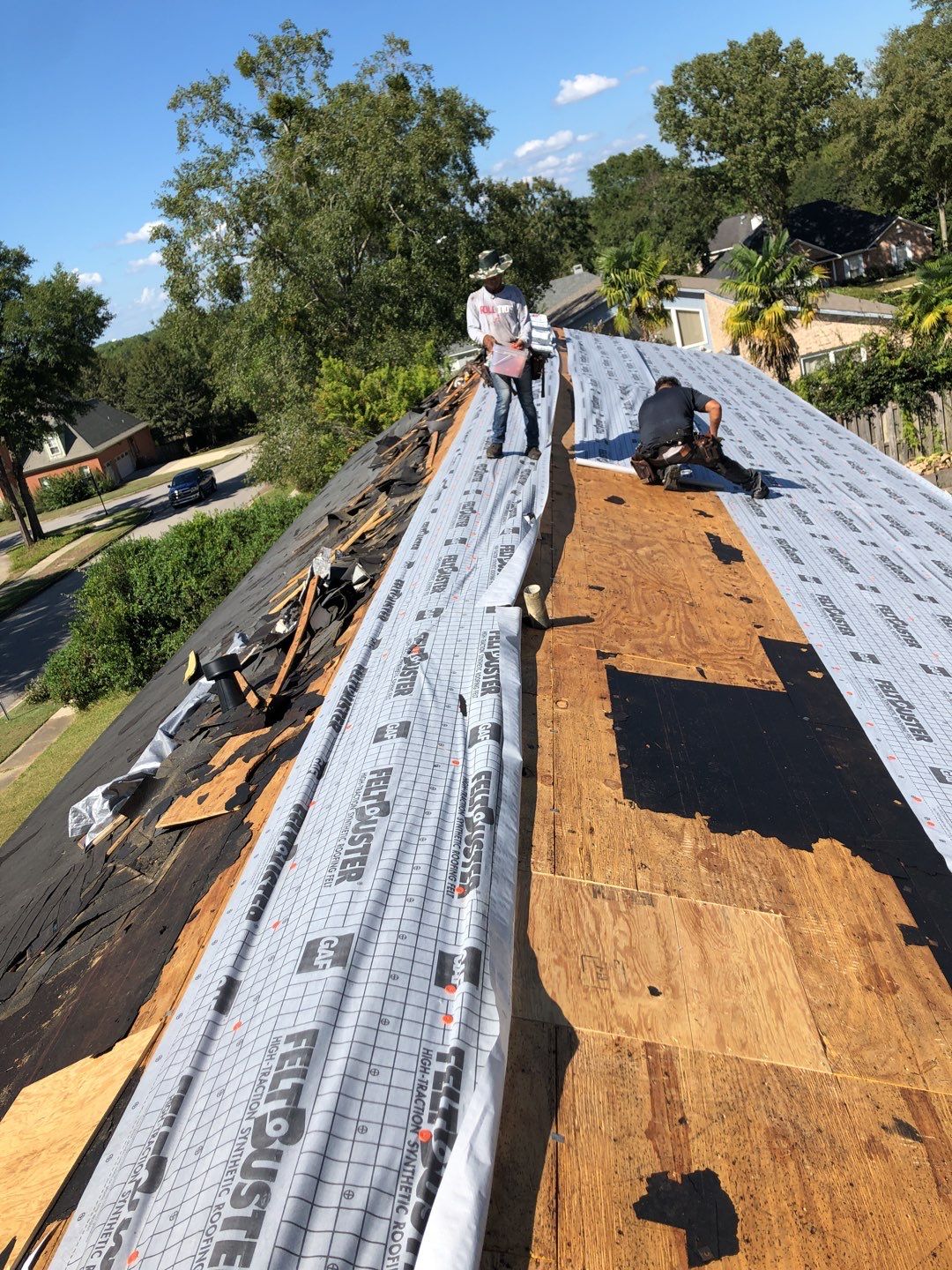 Residential Roofing Installation using Roof Replacement by American Roofing & Construction LLC