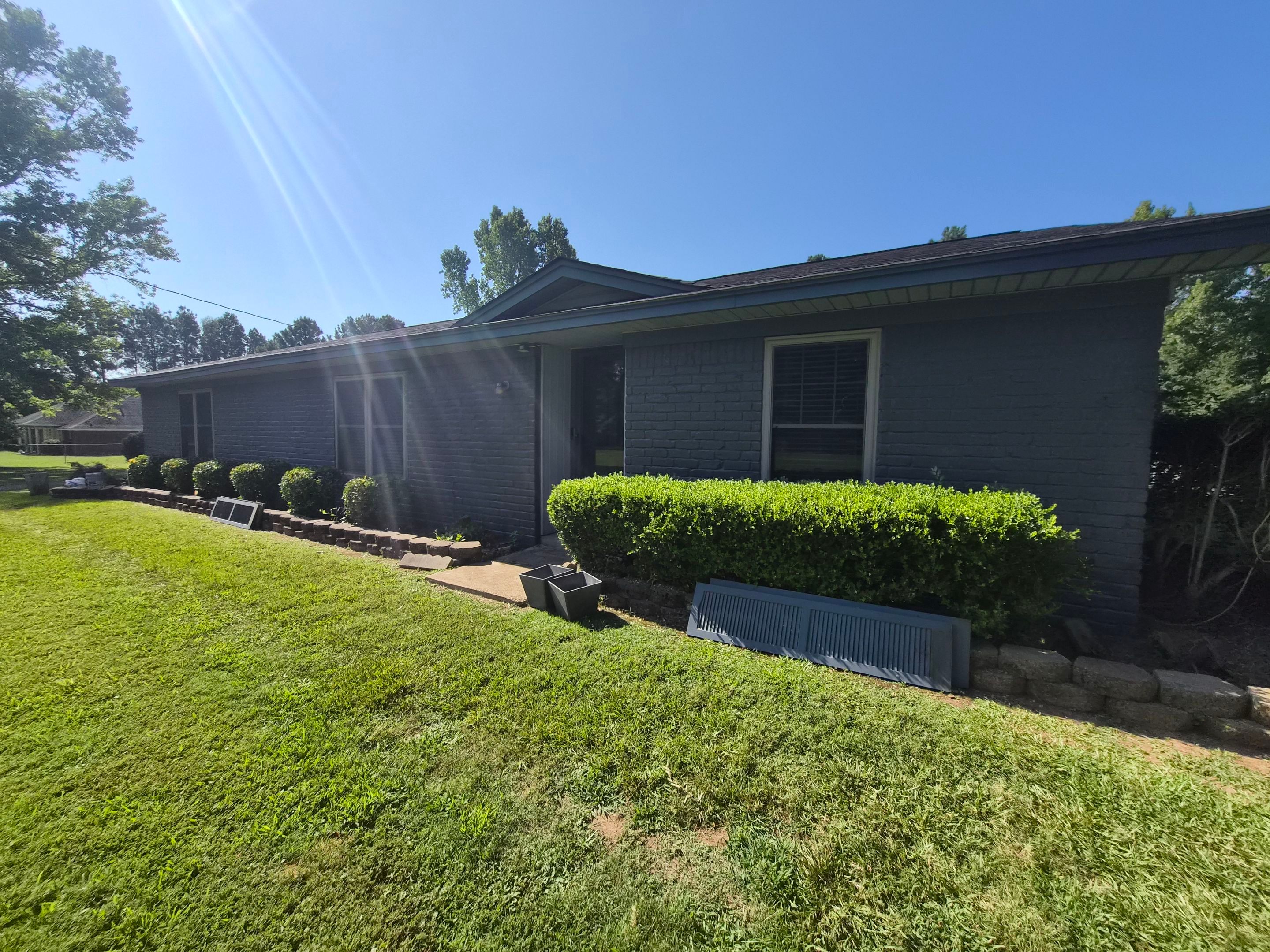 Exterior Refresh Brick Painting Job in Overton, TX by Quality Coats Painting