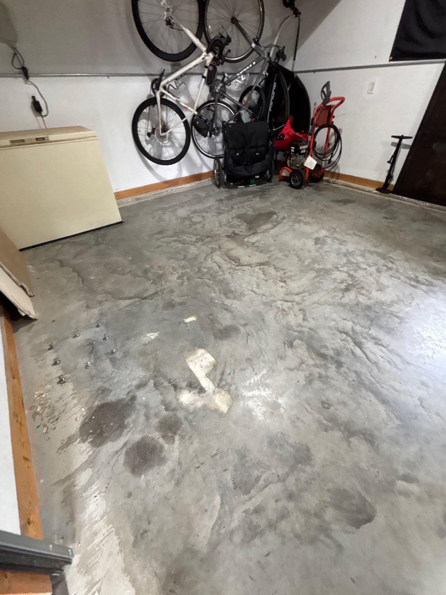 Gray and Black Speckled Polyurea Garage Floor in Dell Rapids by Select Painting, Coatings & Garage Cabinets