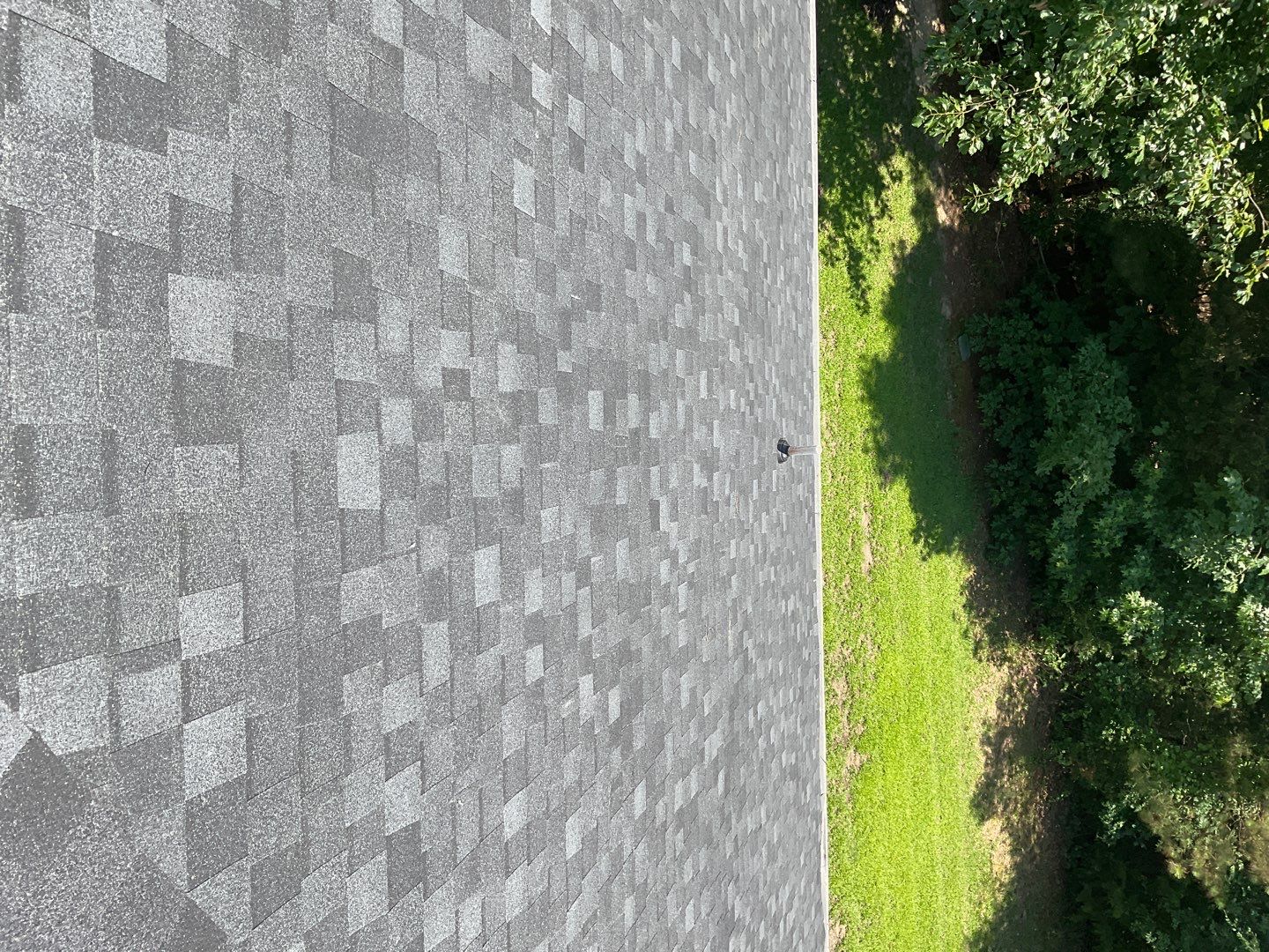 Residential Roofing Installation using Tamko Heritage lifetime shingle in Rustic Black by Sands Roofing & Construction