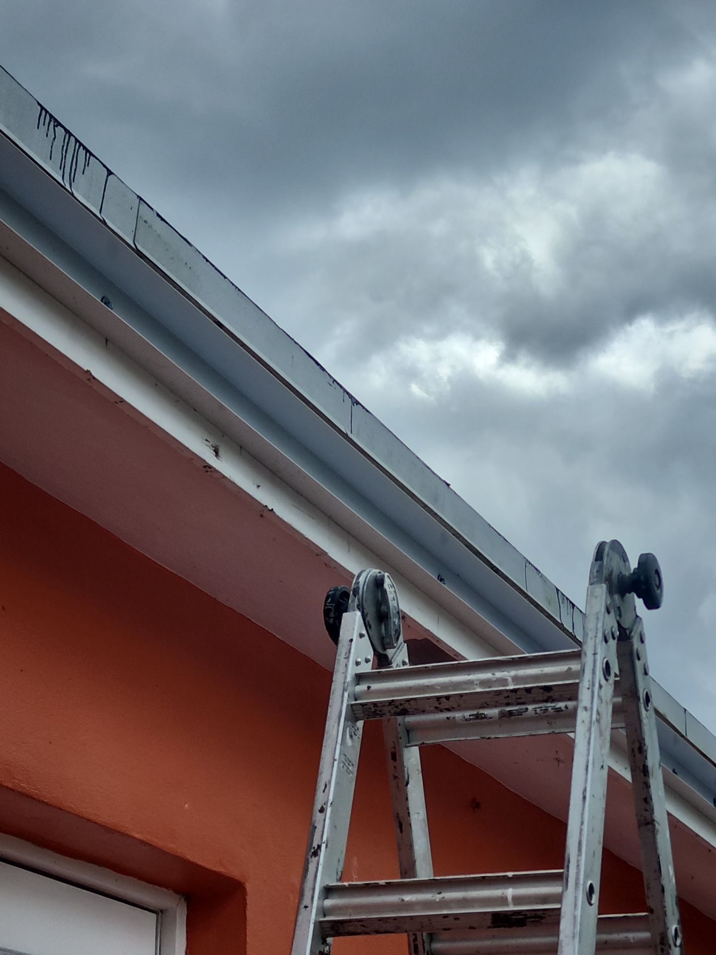 Insulated Screen Enclosure and Wood Tile Deck Installation in Plantation by Aastro Roofing
