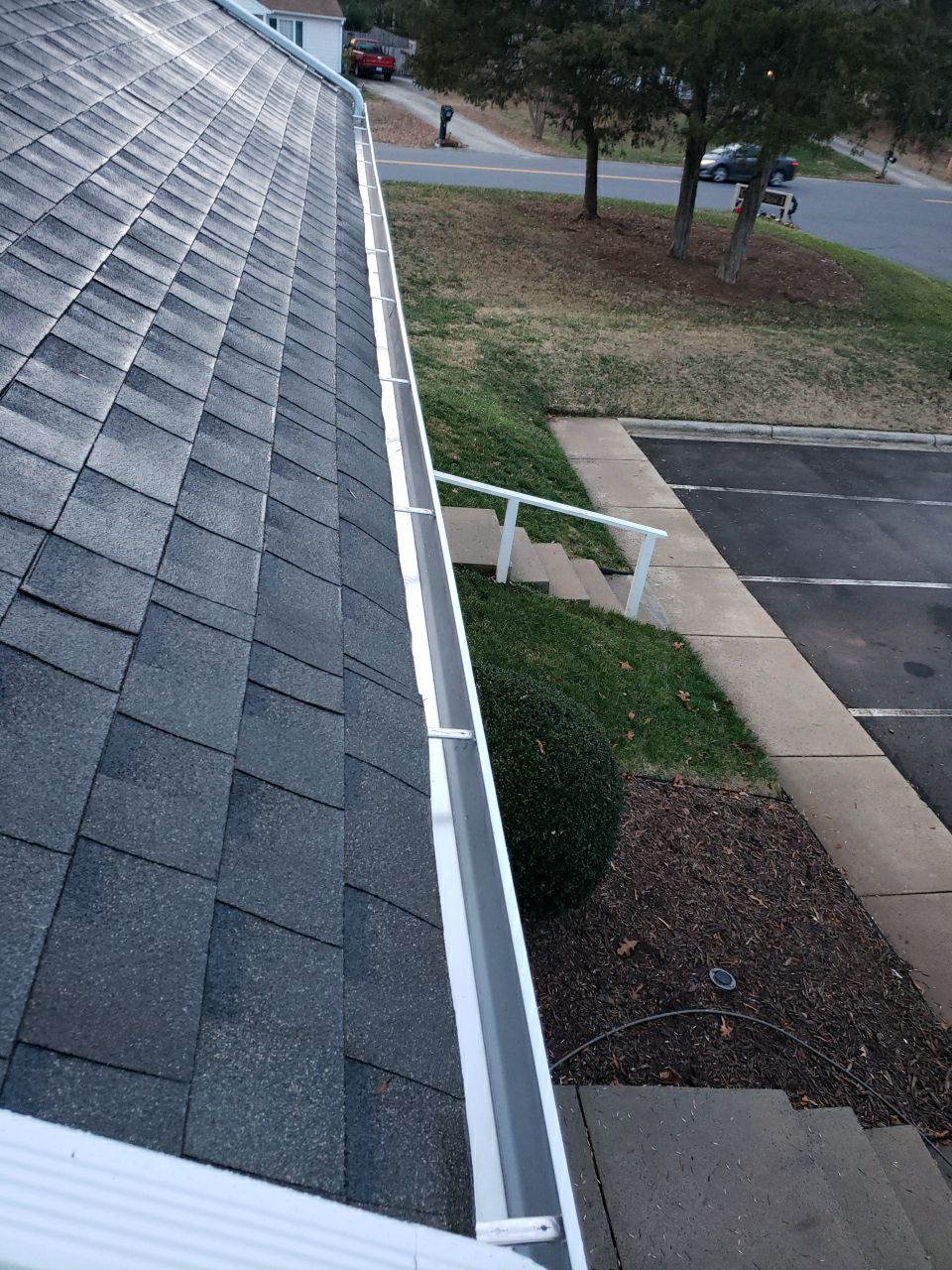 Gutter Cleaning using water by Power Wash Masters LLC