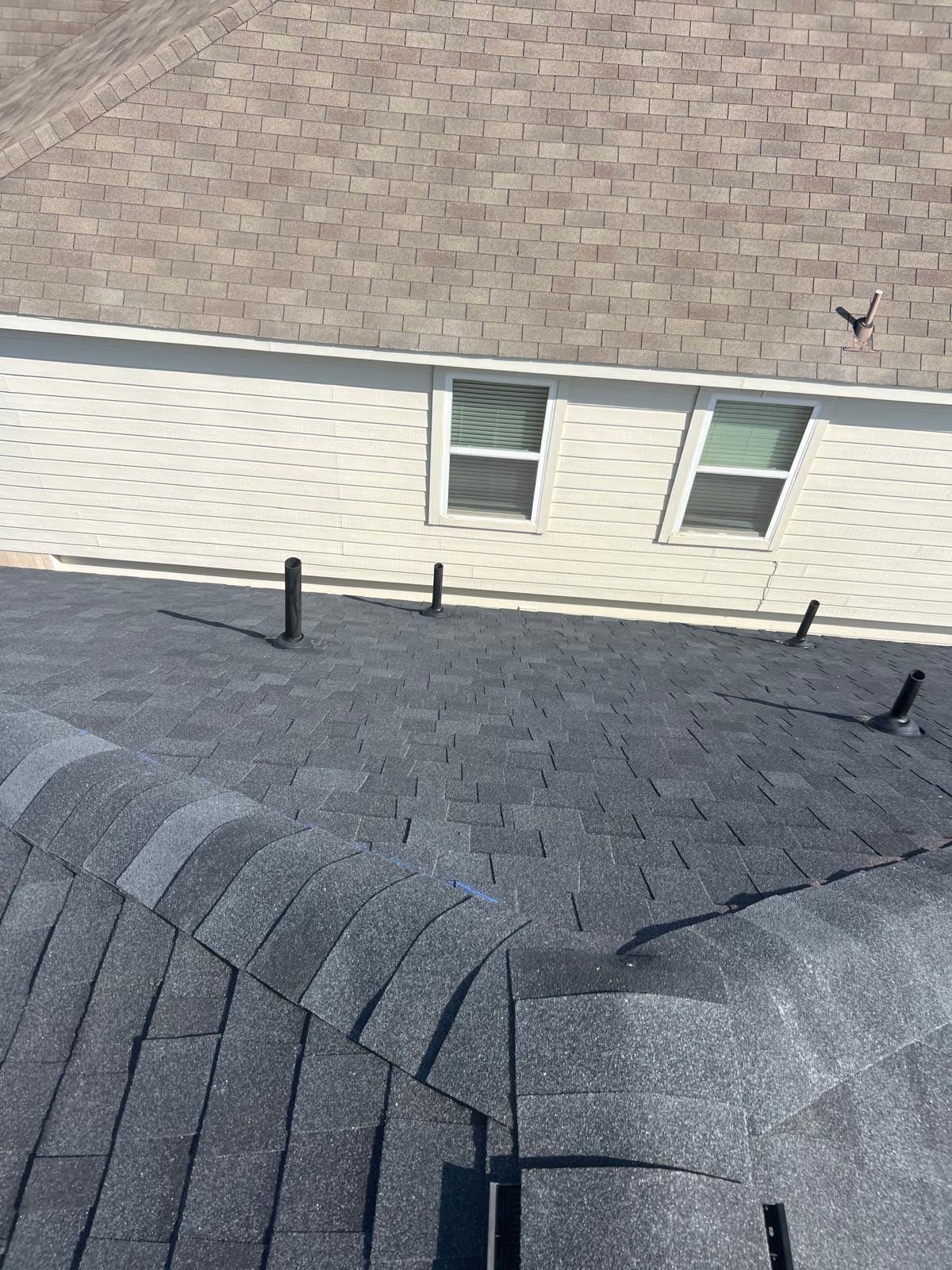 Residential Roofing Installation using Tamko Heritage® Series Rustic Black by CAP Roofing and Construction LLC