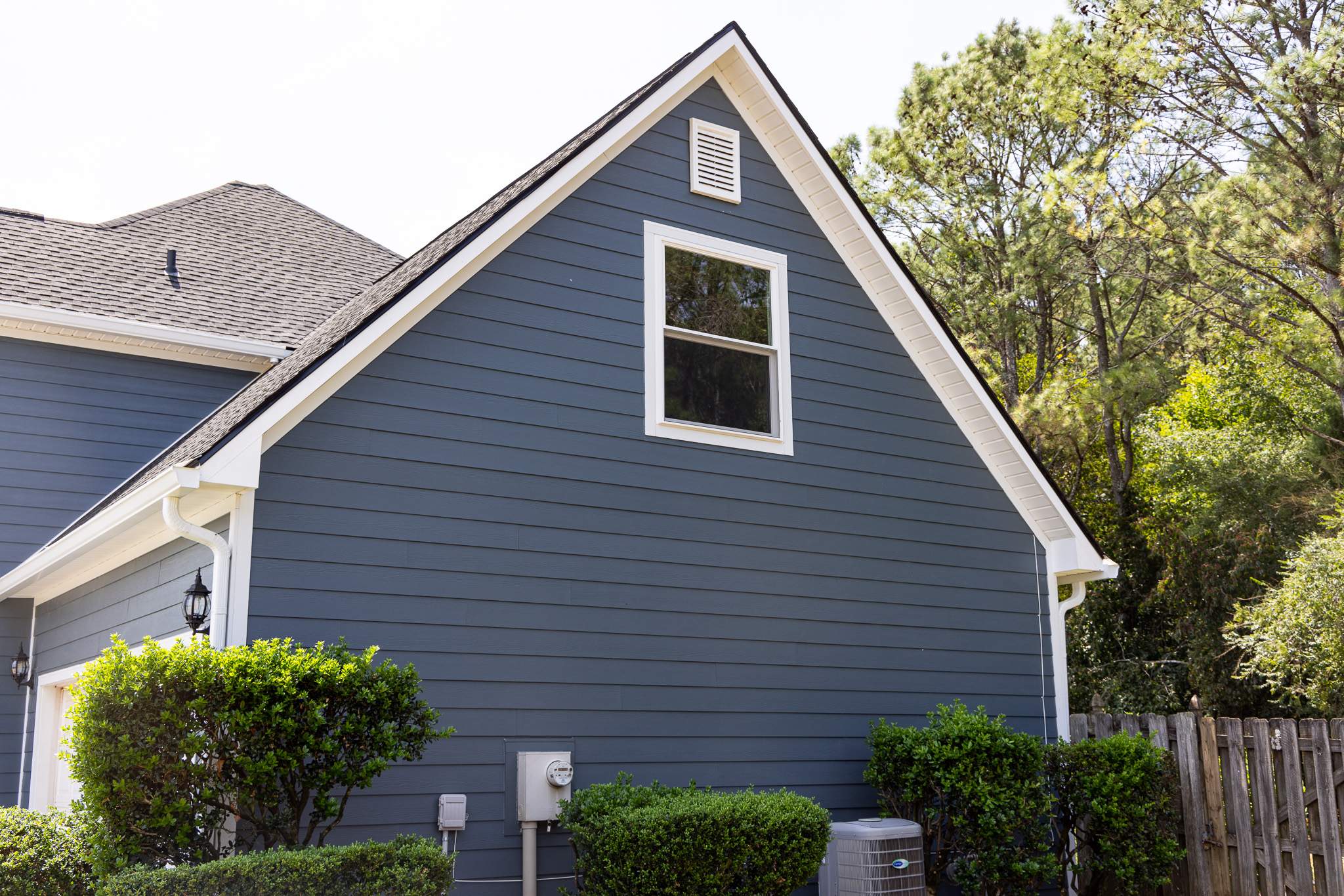 Evening Blue Hardie + Windows by Freedom Exteriors