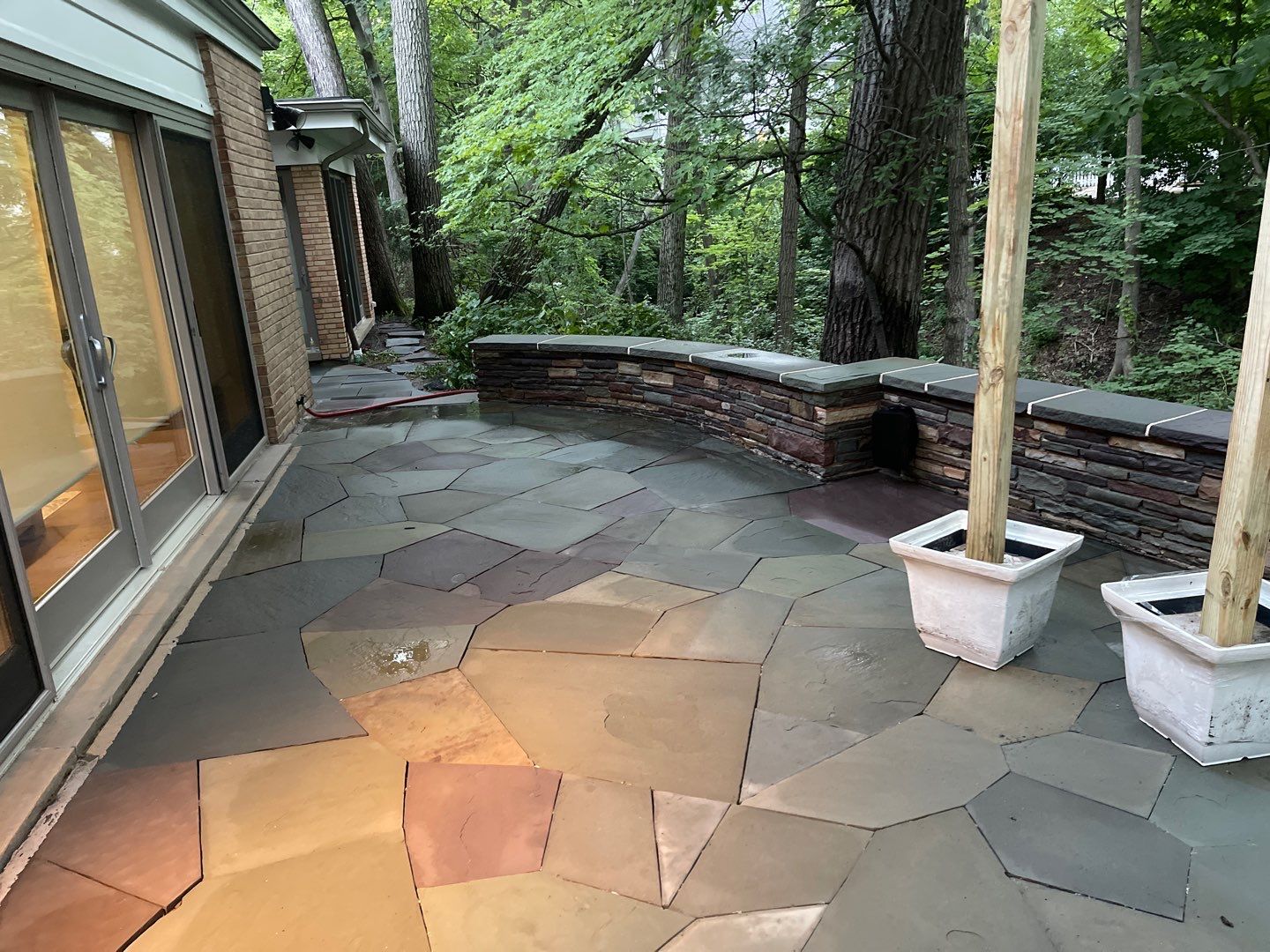 Bluestone patio cleaning by Northern Power Washing LLC.