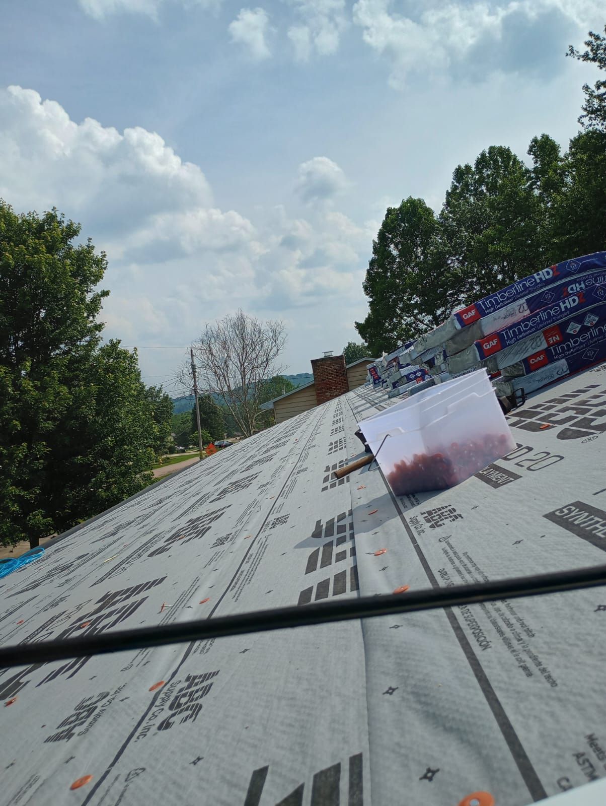 Residential Roofing Installation using GAF Timberline HDZ Charcoal by Rainstoppers Roofing