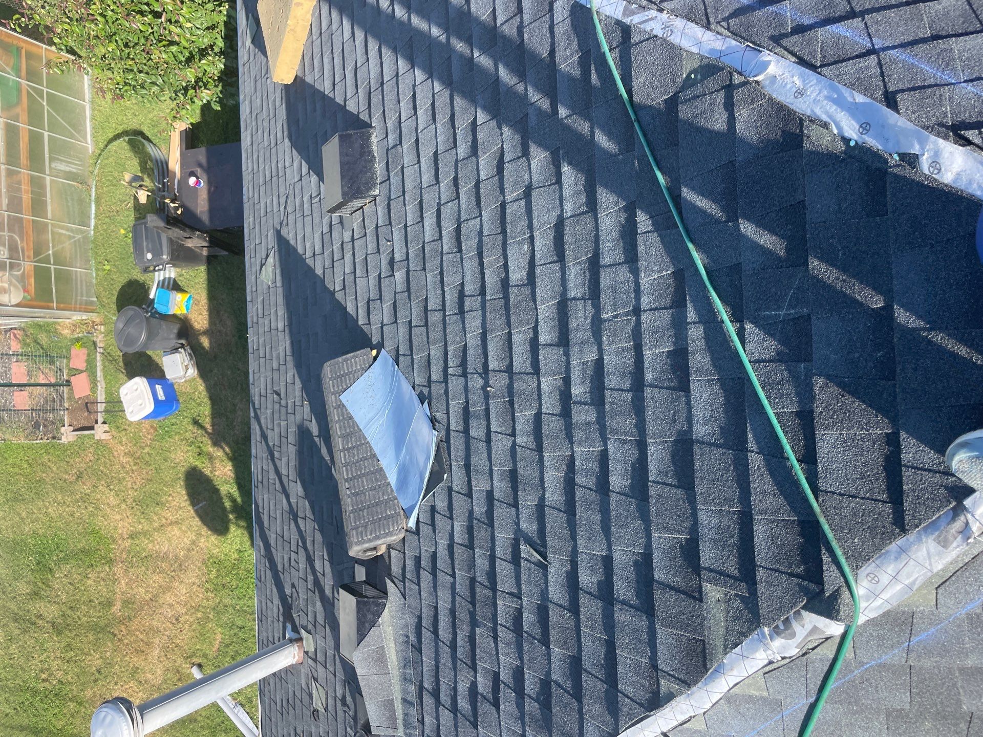 Residential Roofing Installation using GAF Timberline HDZ Charcoal by Rainstoppers Roofing