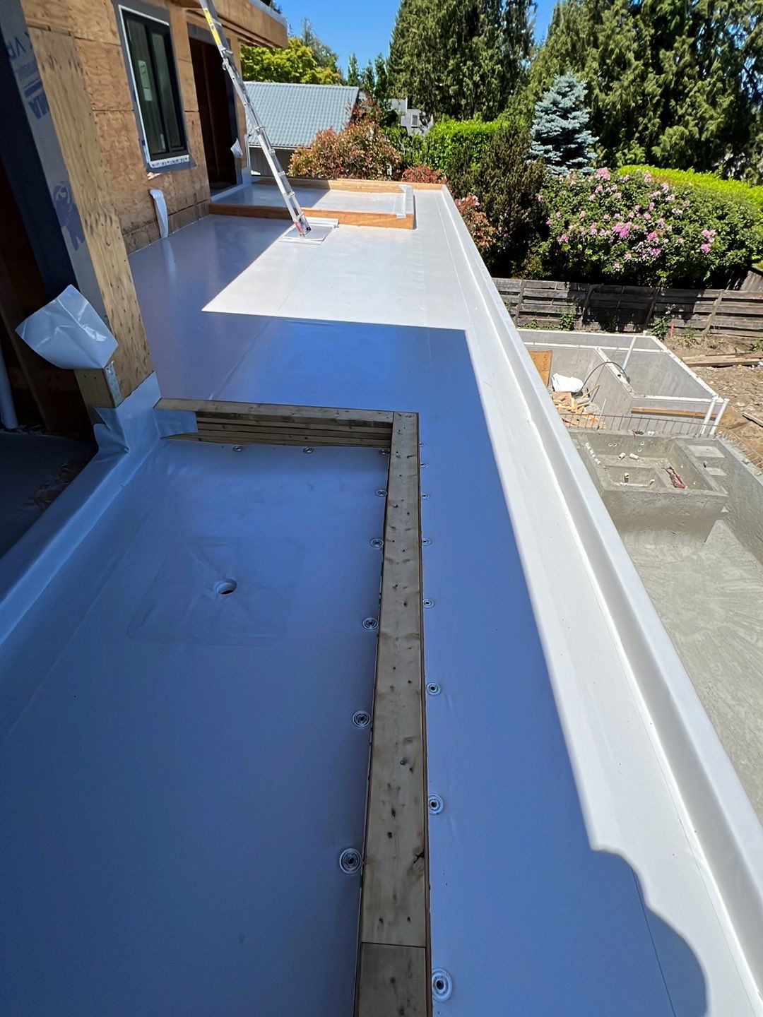 Residential Roofing Installation using Durolast roofing membrane by Top Notch Roofing Inc