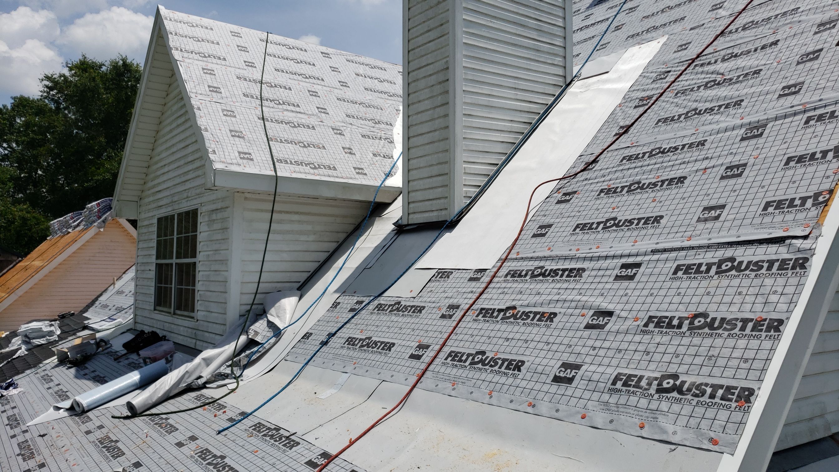Residential Roofing Installation using Roof Replacement by American Roofing & Construction LLC