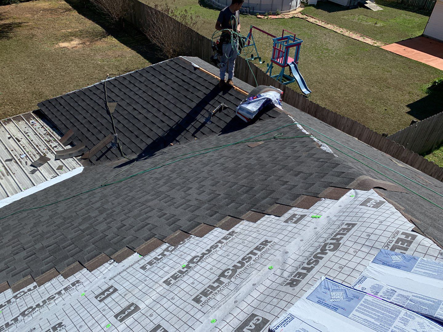 Residential Roofing Installation using Roof Replacement by American Roofing & Construction LLC
