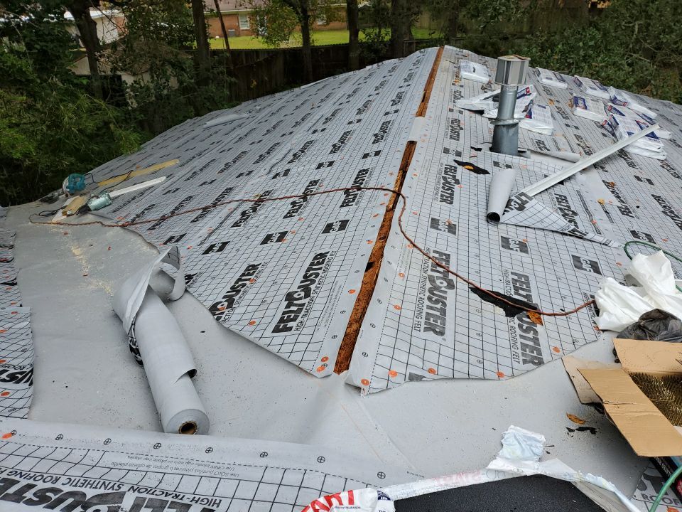 Residential Roofing Installation using Roof Replacement by American Roofing & Construction LLC