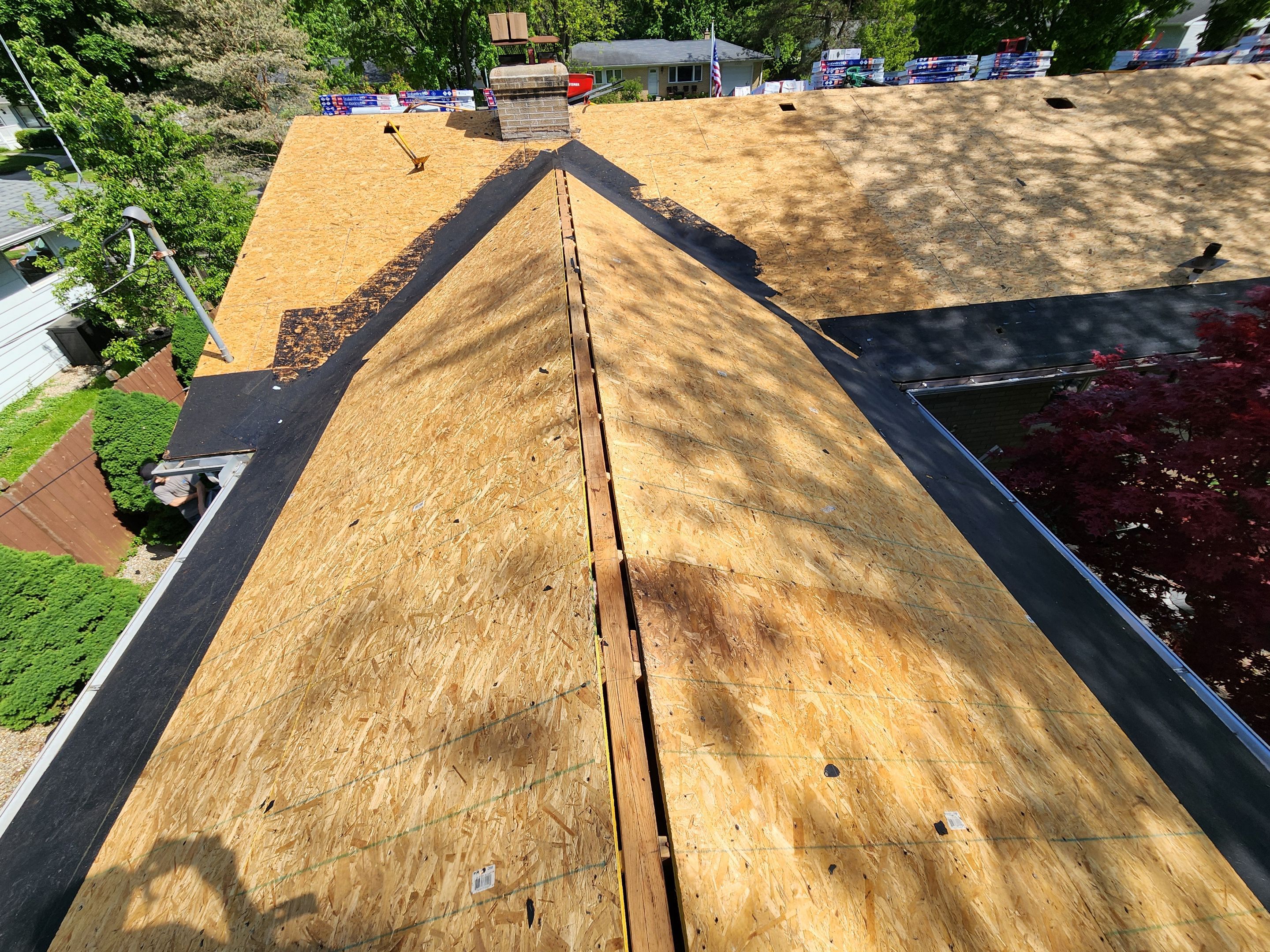 Installing new Roof, Fascia, Soffit, and Gutters. New custom trim around garage door. by Acme Exteriors