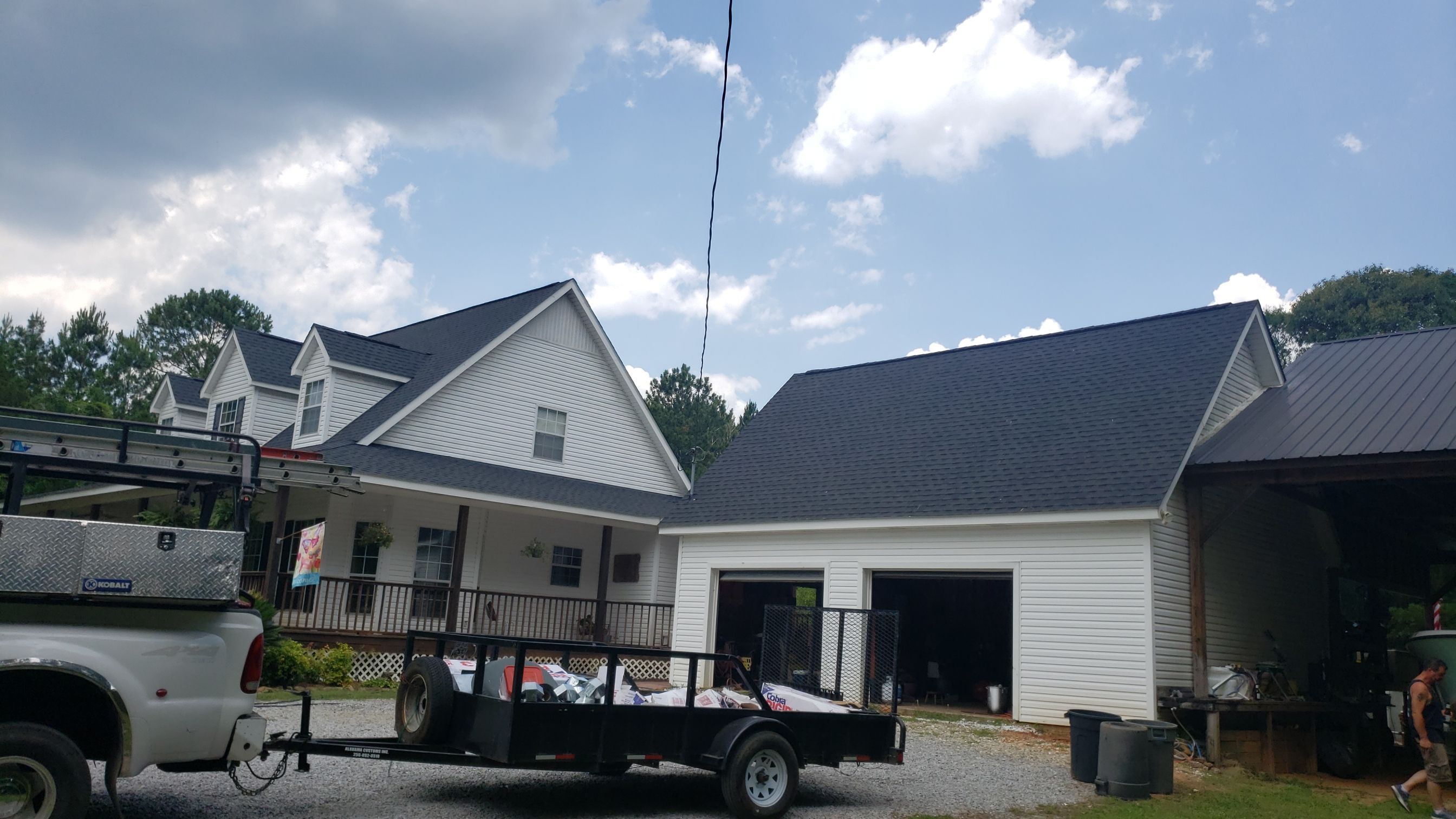 Residential Roofing Installation using Roof Replacement by American Roofing & Construction LLC