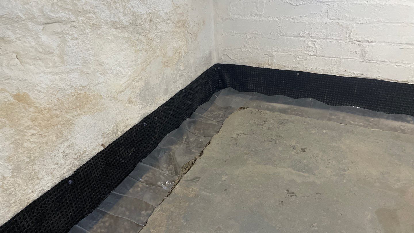 Interior Drain Tile & Wall Drainage in Northeast Minneapolis by Waterproofing Northeast