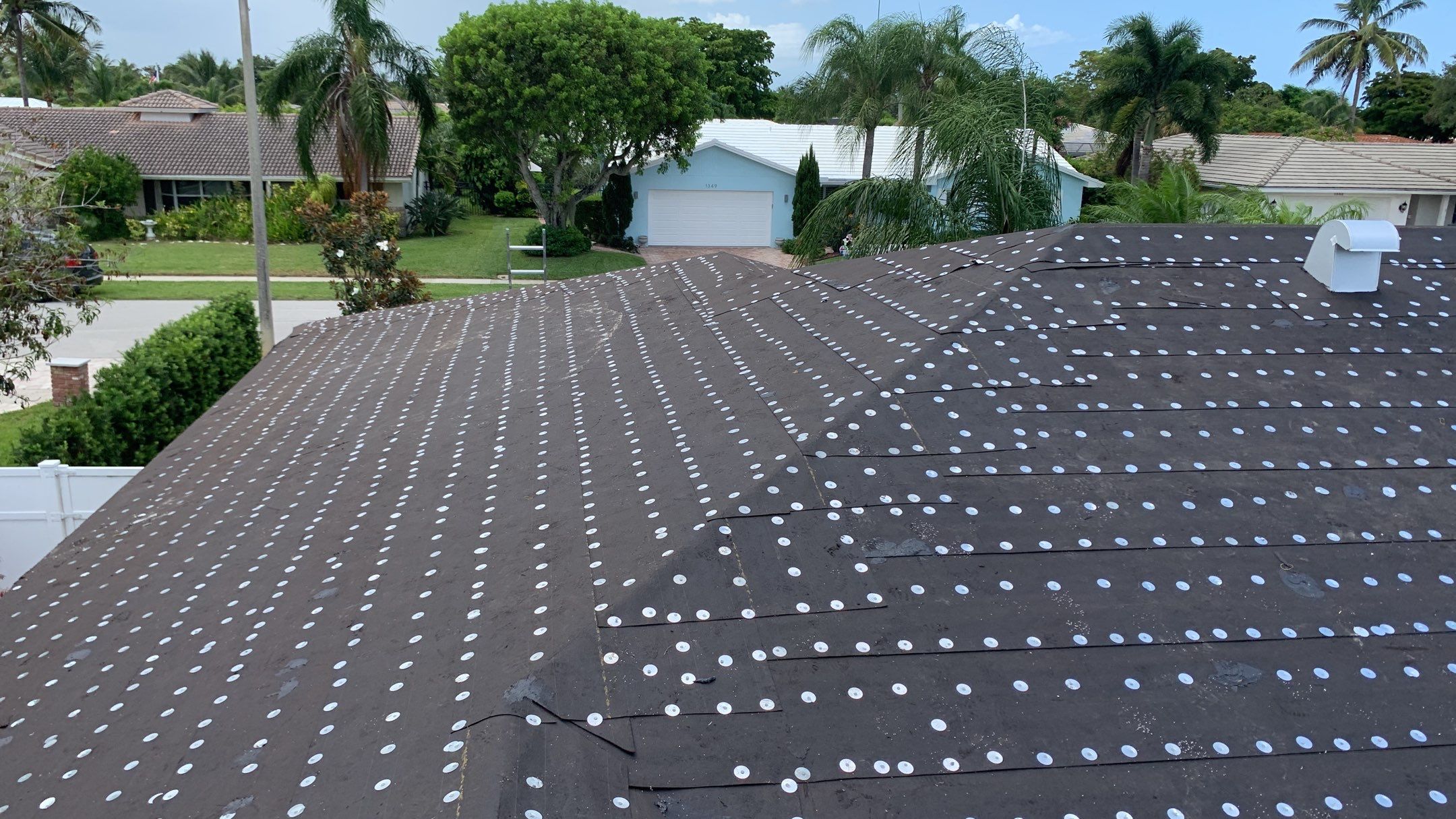 Residential Roofing Installation using 1" Nail strip metal roof by BLUES BROTHERS ROOFING