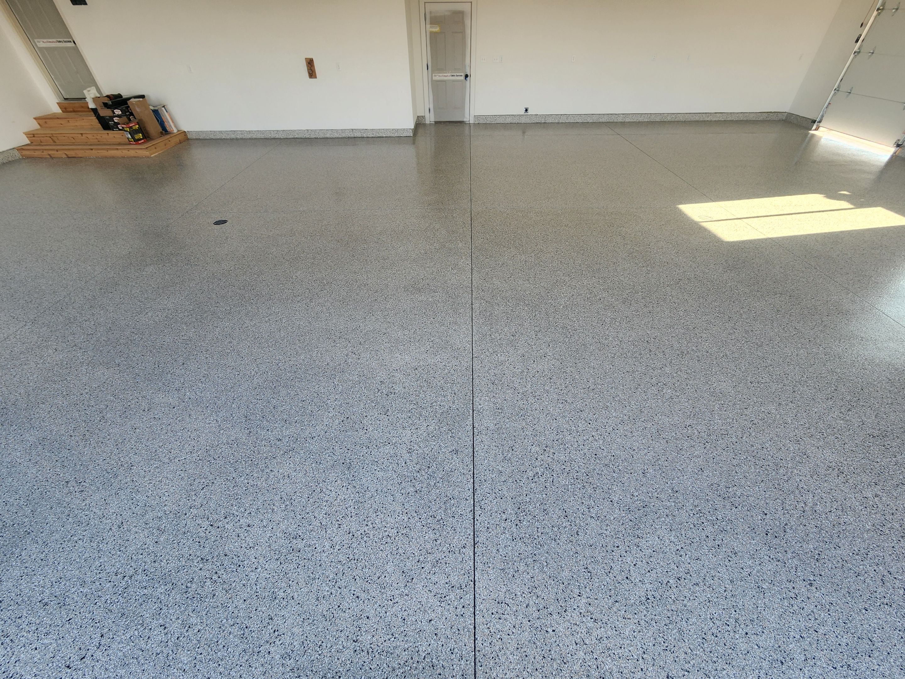 Garage using Domino by Select Painting, Coatings & Garage Cabinets