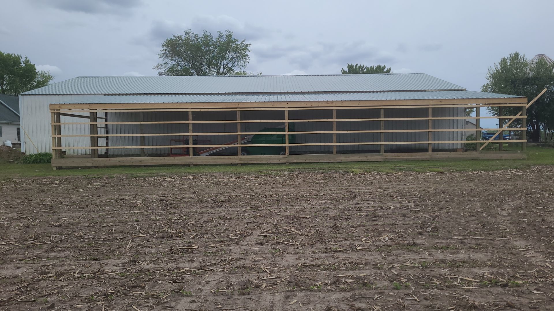 Reskin pole barn and add lean-to by Dagny Builders