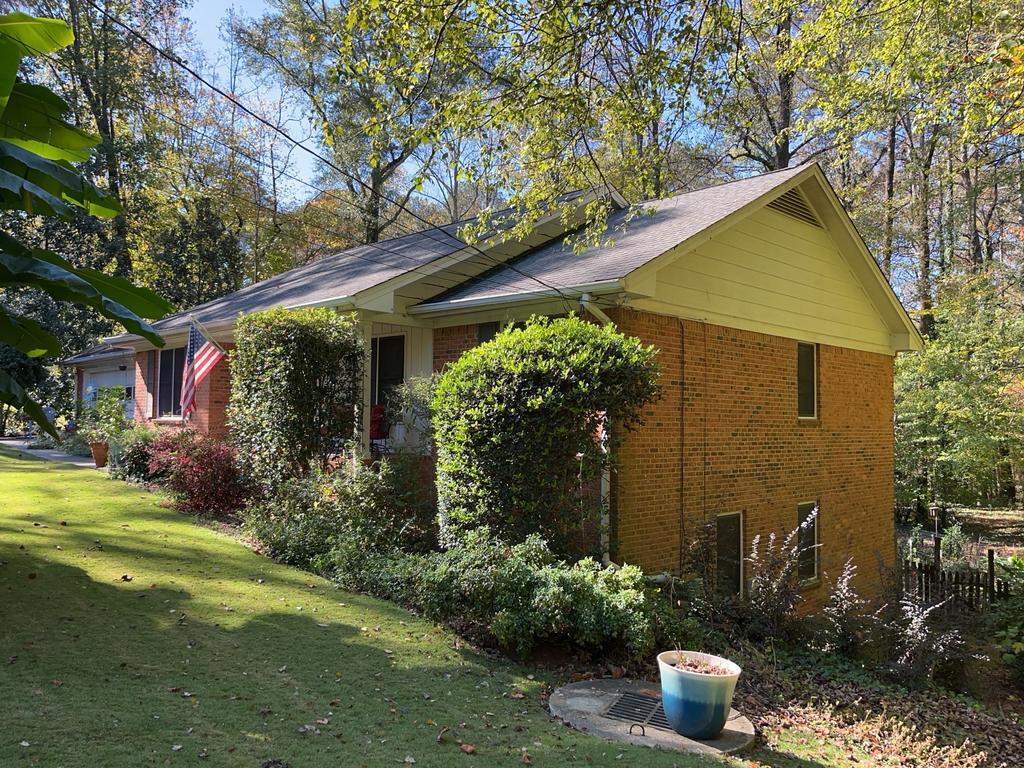 Gable Siding and Rotten Wood Replacements in Atlanta, GA with New Door and Window Installs by Nelson Exteriors 