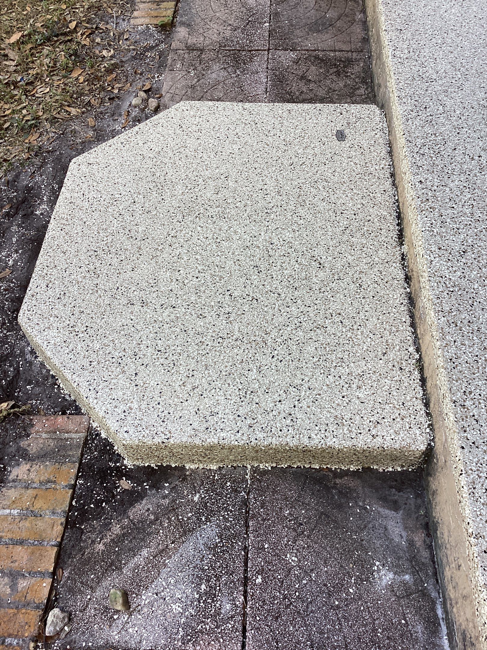 Patio using Pebble Beach by Amvet concrete coatings llc