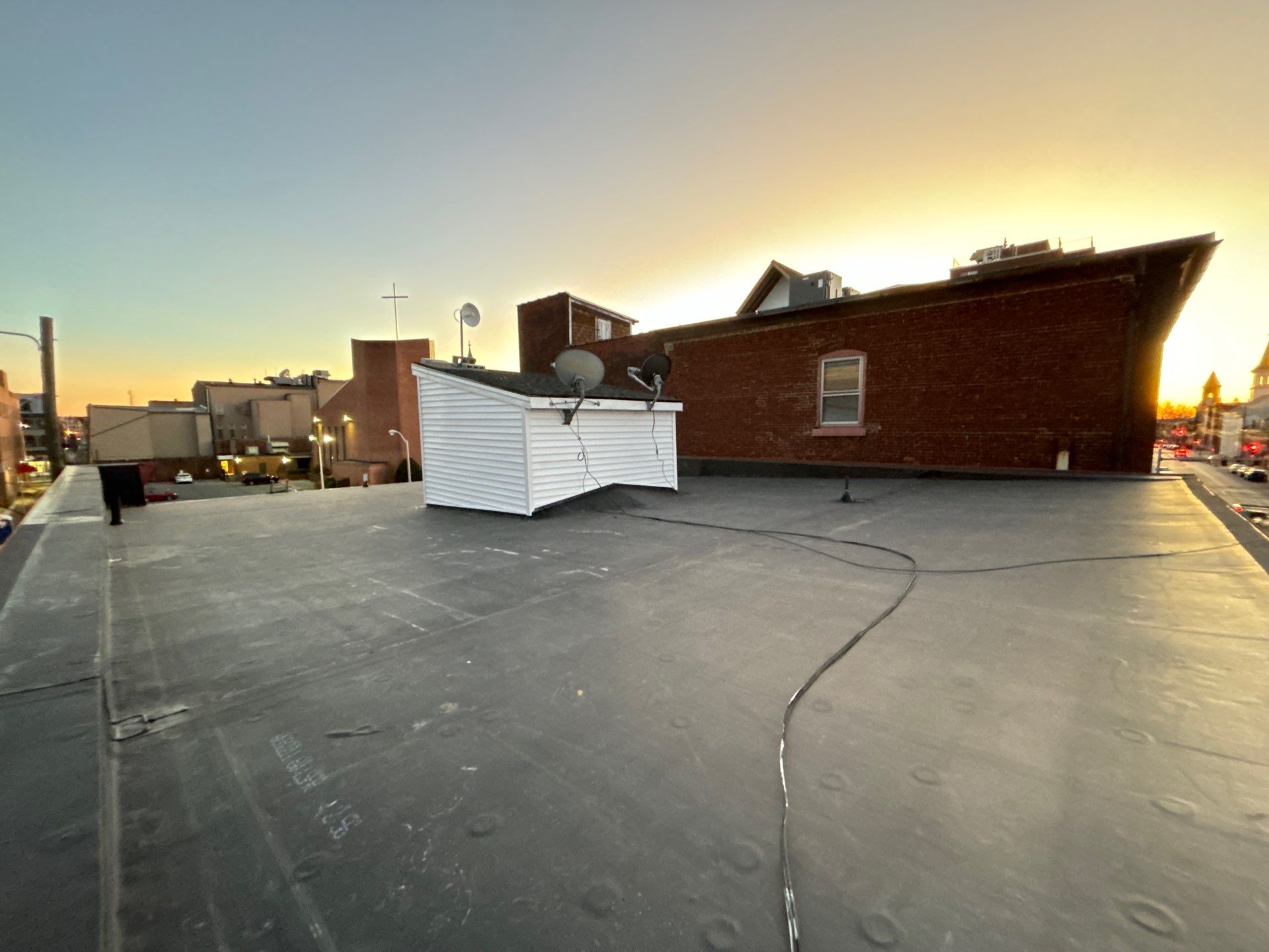 Commercial Roofing Installation using EPDM Rubber Roofing by Roof Ninja LLC 
