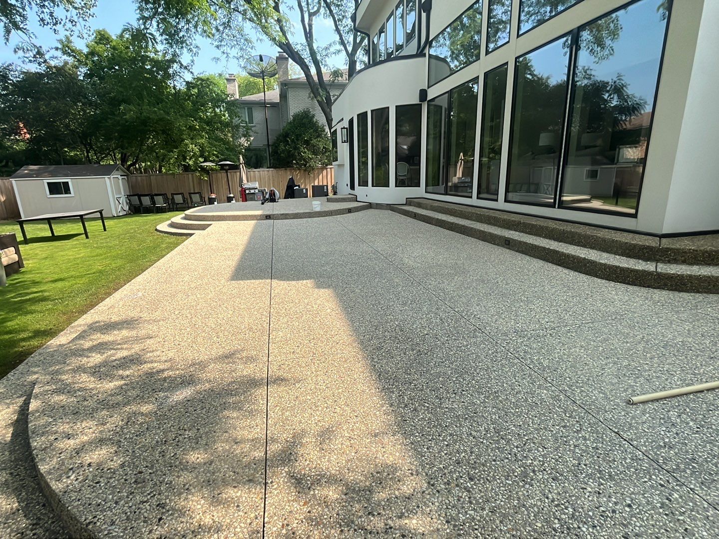 Aggregate concrete cleaning and sealing using Surebond SB-9000 by Northern Power Washing LLC.