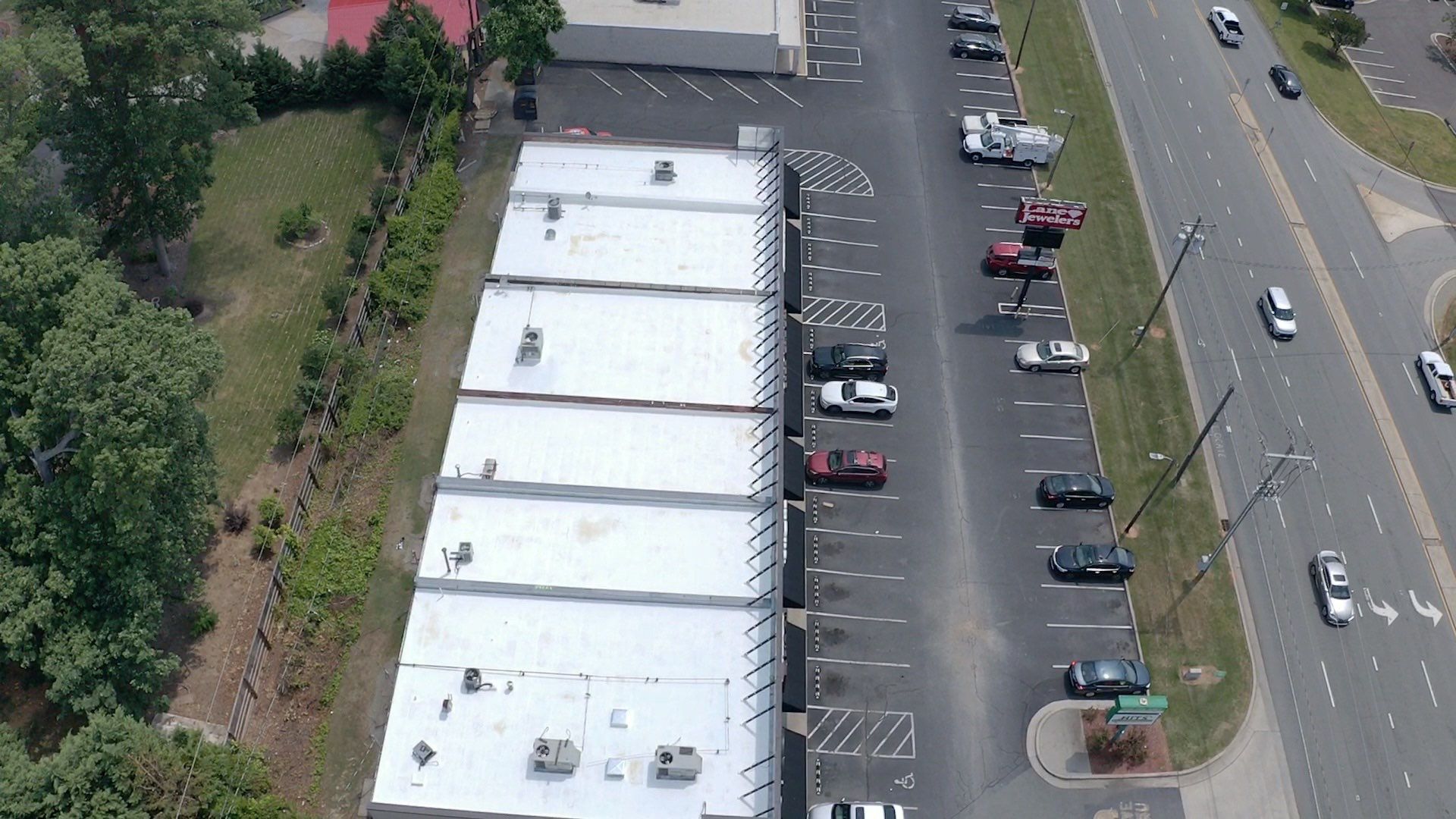 Commercial Roof Coating using Fiberseal basecoat and Silicon Topcoat by Just In Time Roofing and Restoration