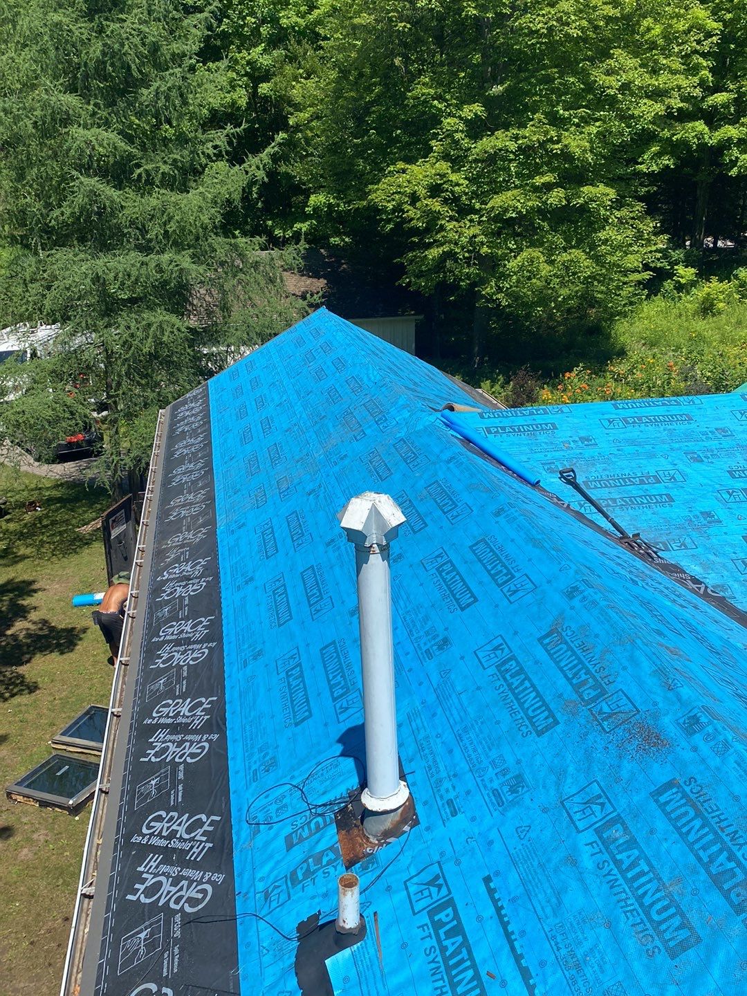 Residential Roofing Installation using 24 Ga Standing Seam Meta by Jay Carter Roofing & Sheet Metal