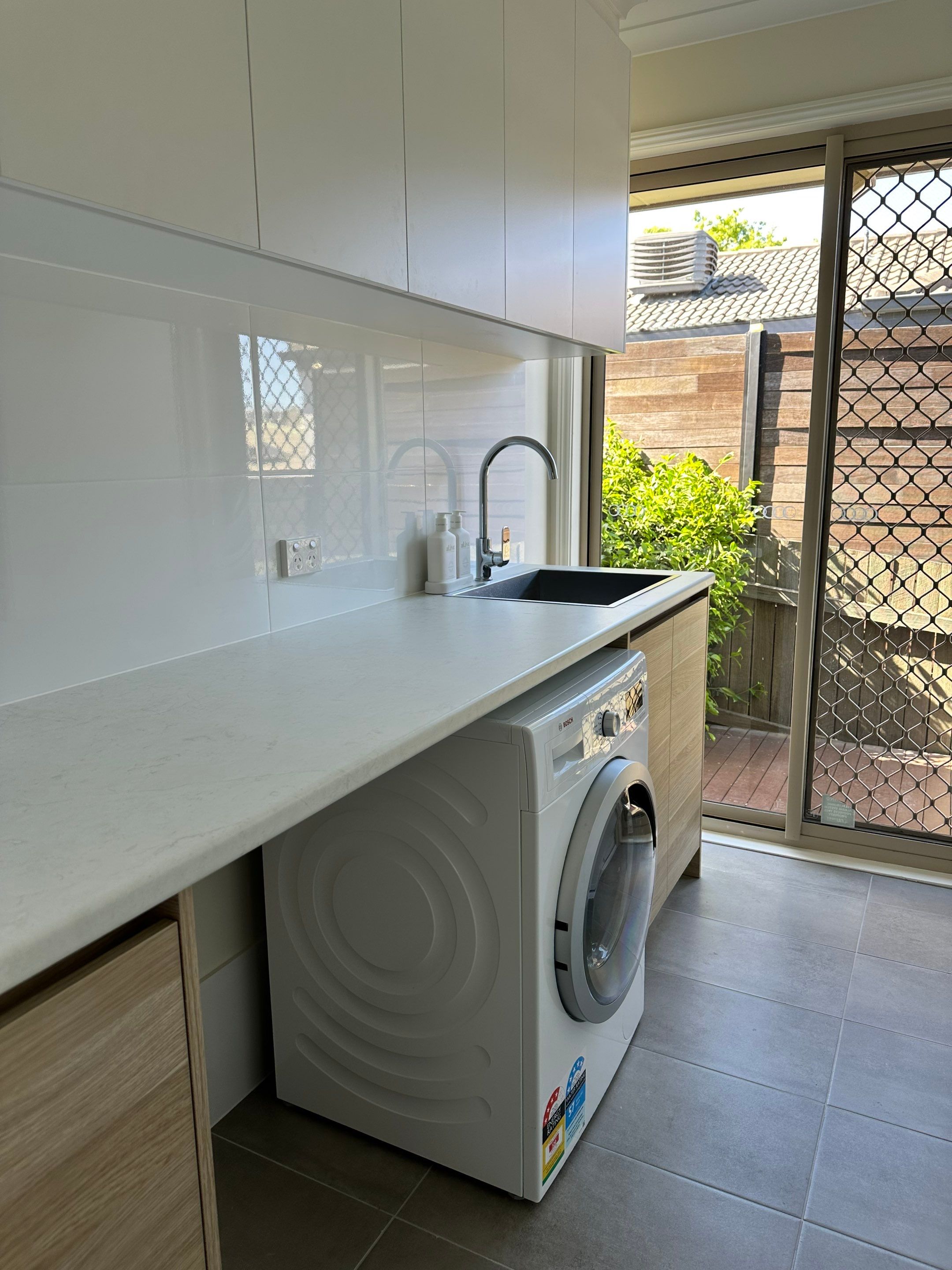 Main Bathroom, Ensuite, Toilet, Powder Room, and Laundry Renovation by Re-seal Bathrooms