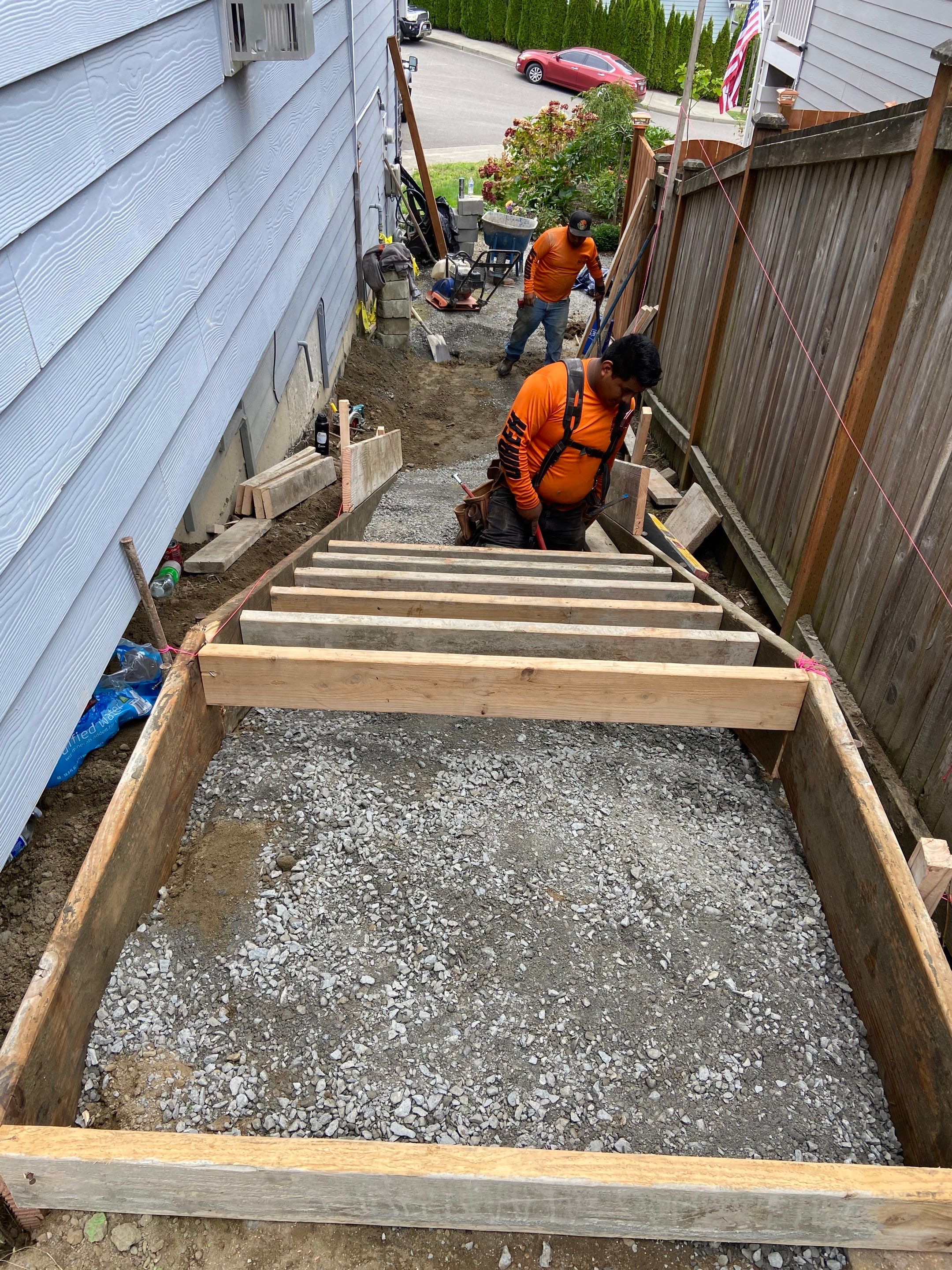 Jireh Outdoor Projects | Concrete Stair Repair and Retaining Wall by Jireh Asphalt & Concrete Inc 