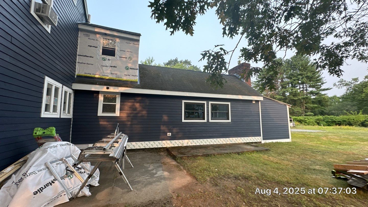 James Hardie Lap Siding Installation in Chelmsford, MA by Mighty Dog Roofing of Greater Middlesex County