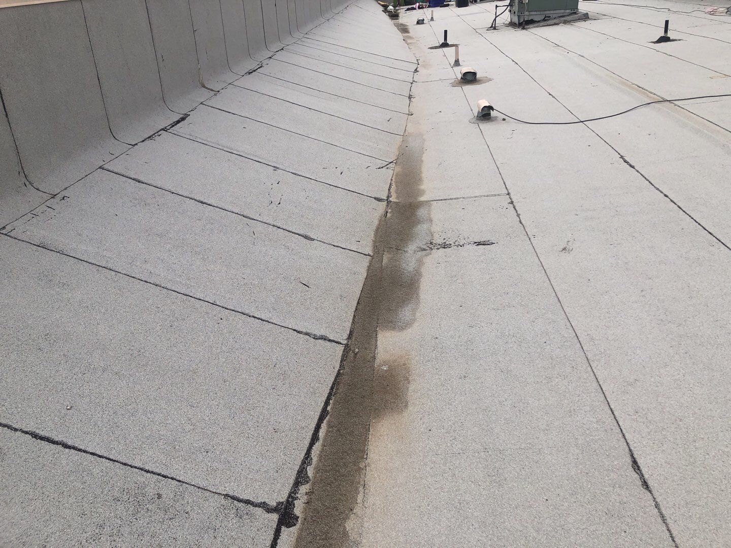 Spray foam and coatings using Conklin Benchmark/PUMA XL coatings and spray foam by Straight Edge Roofing Inc