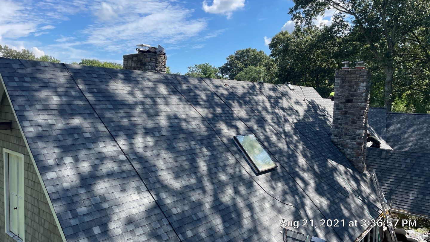 Roof Replacement using IKO Dynasty by American Home Contractors