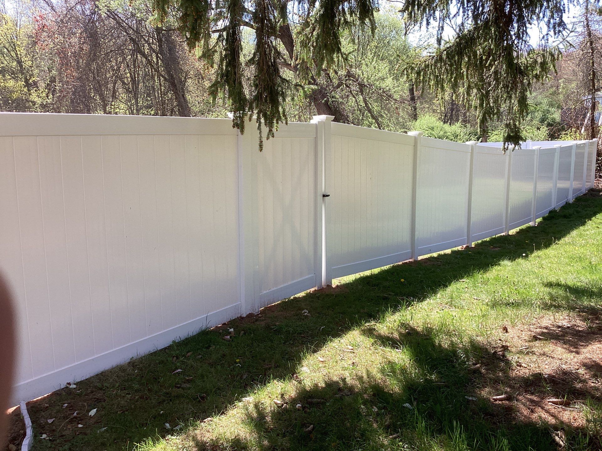 New White Vinyl privacy fence with matching gates  by DiGiorgi Roofing and Siding Inc