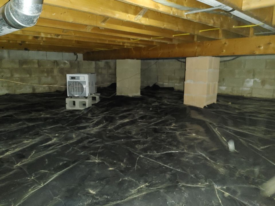 Crawl space encapsulation and Waterproofing using Structural Wood and Steel Reinforcements by Toledo Basement Repair 