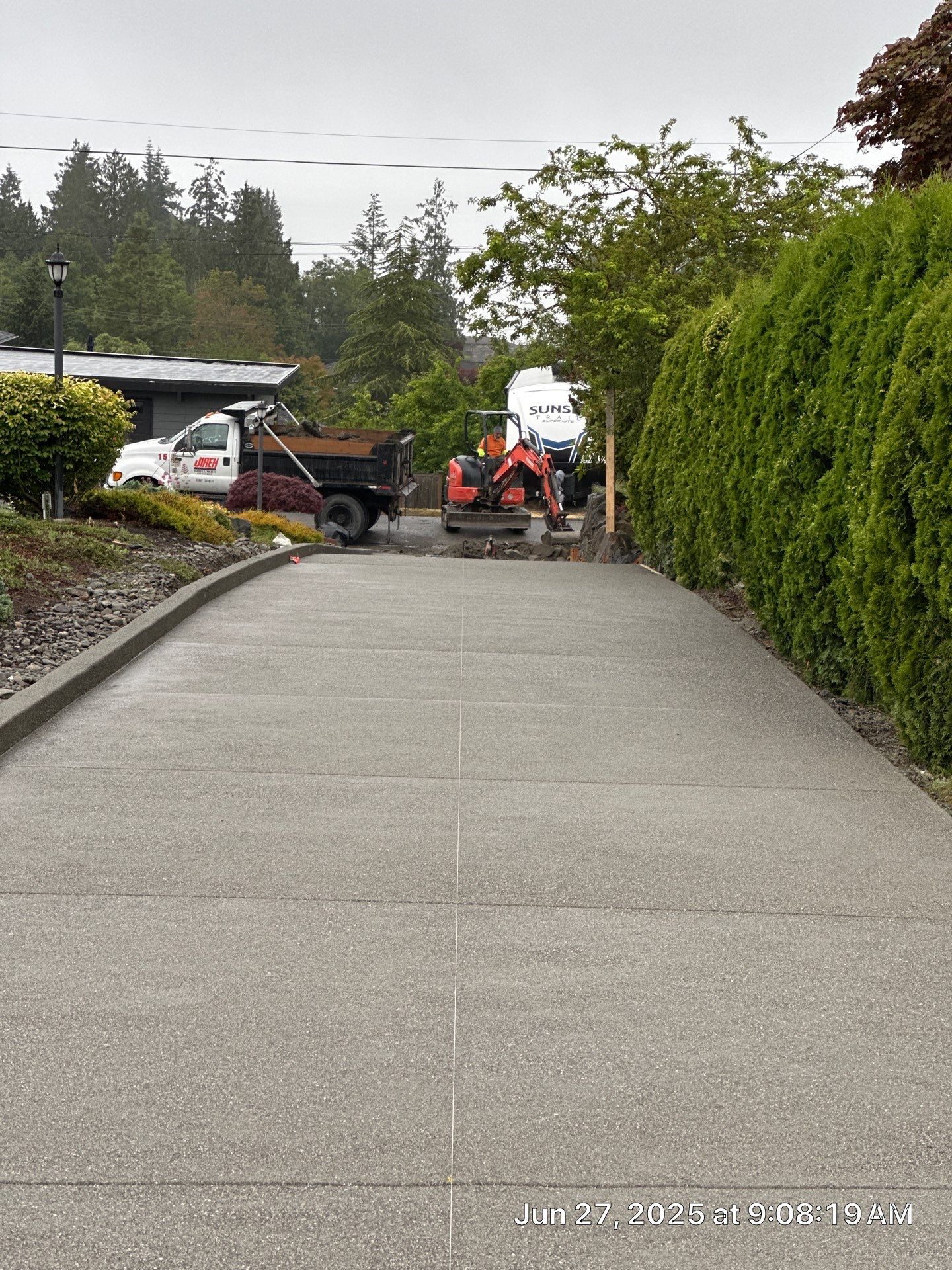 Concrete Driveway Makeover w/ Asphalt Patch | Everett  by Jireh Asphalt & Concrete Inc 