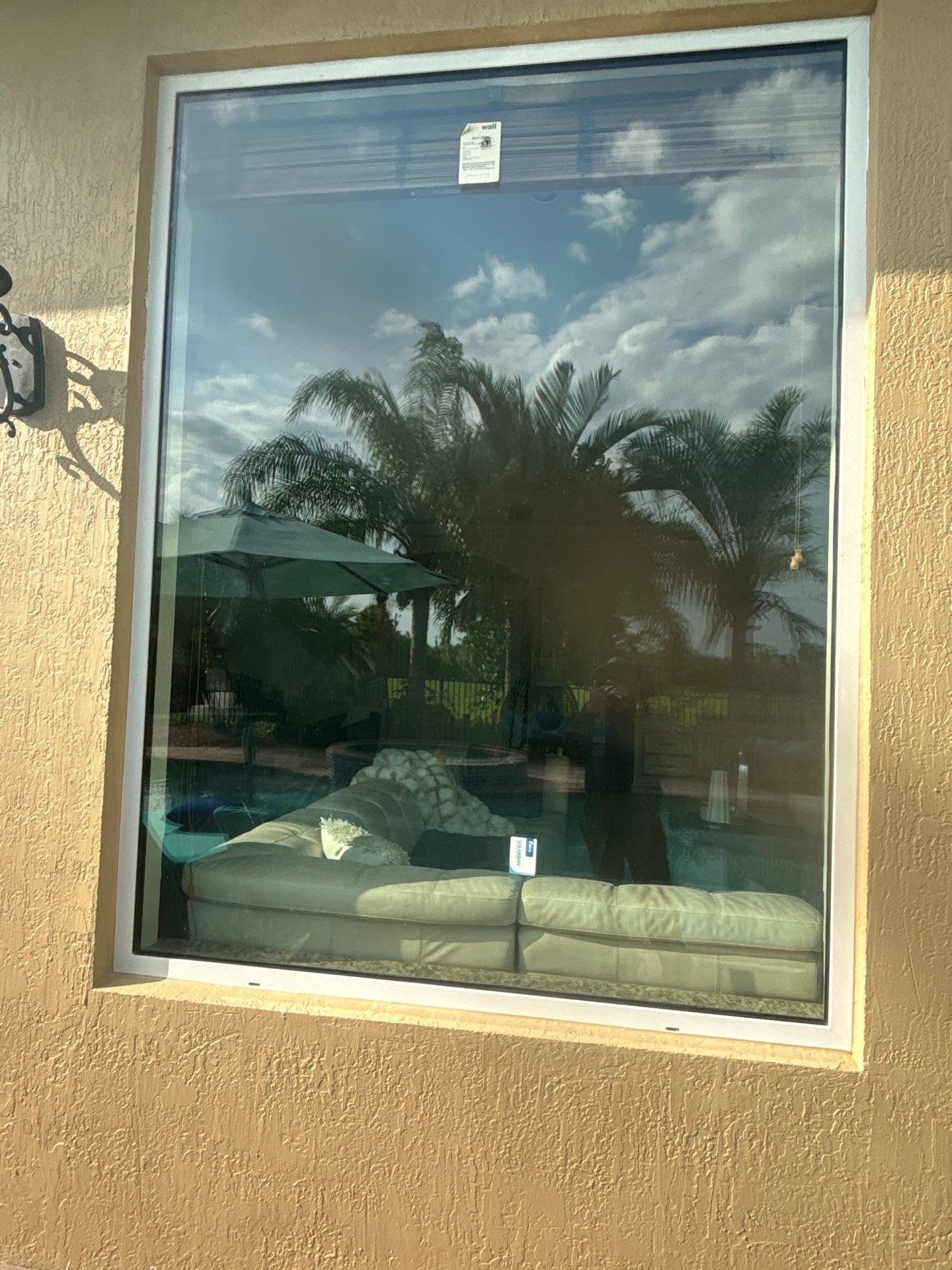 PGT Black pocket doors and Euro-Wall storefront & SGD by Windows For Life 