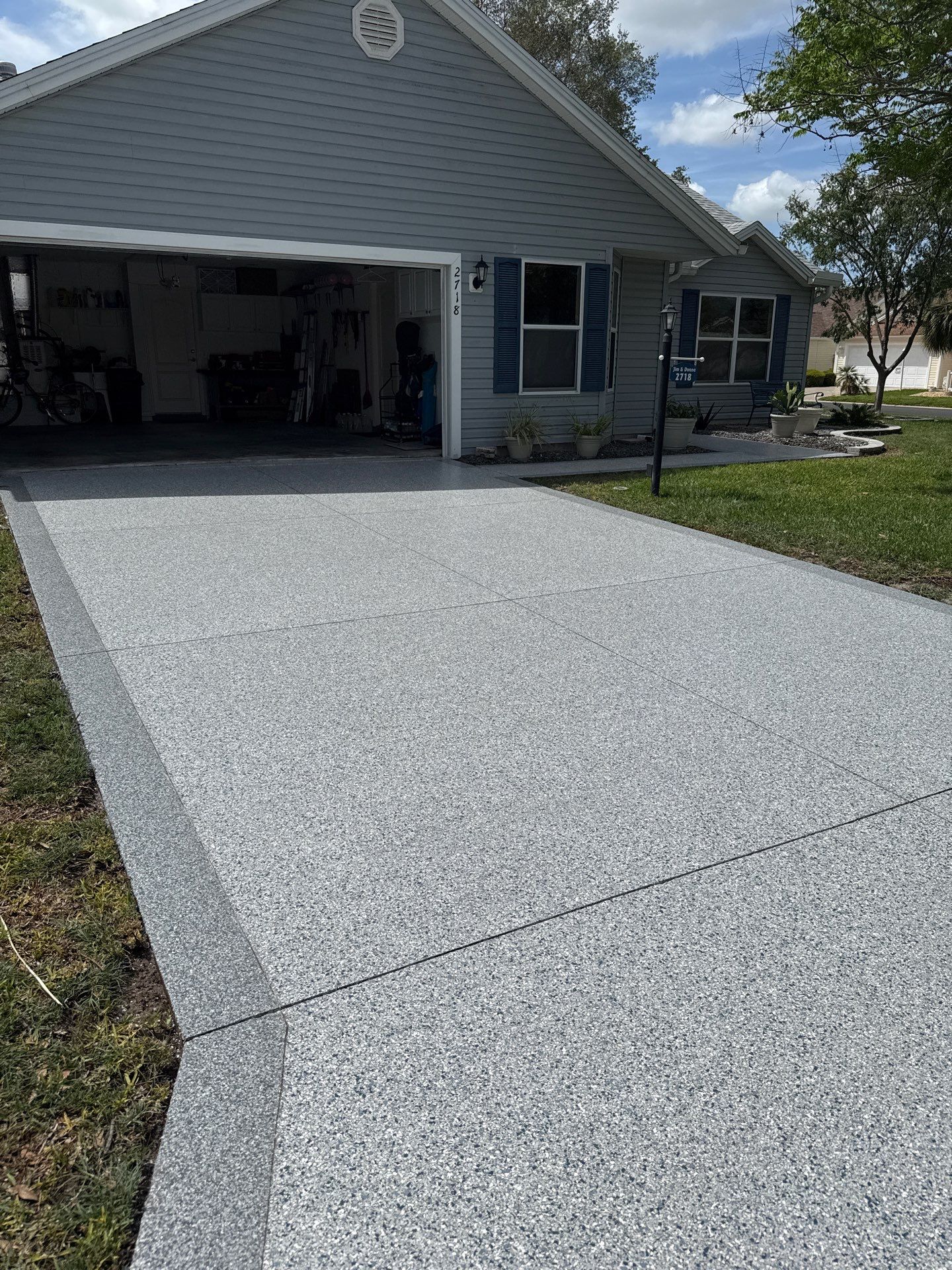 Driveway Tidal Wave with Cool Breeze Border and Sidewalk by Innovative Concrete Coatings 