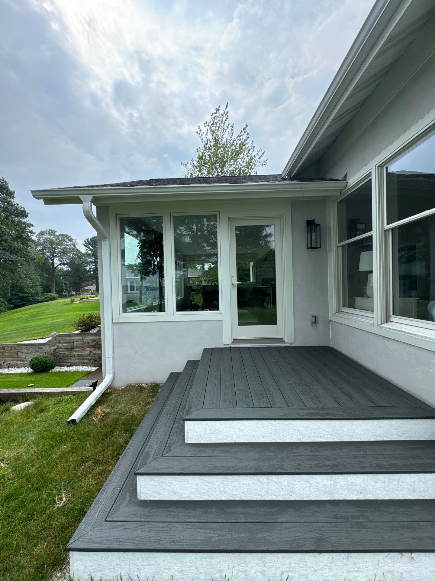 Norton Shores Residential Stucco Repair and Exterior Painting Refresh by Gordon Painting
