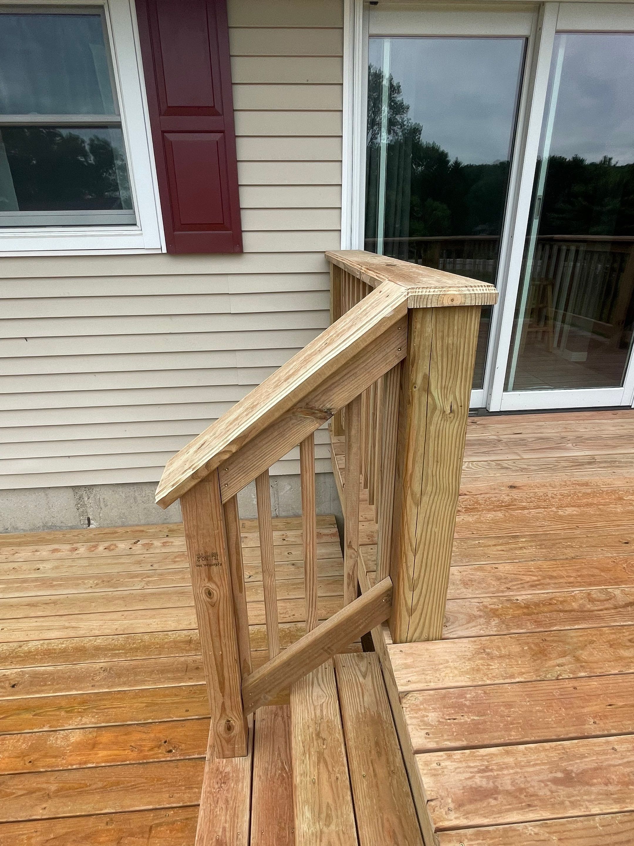Deck Installation using Treated Lumber by Avalon Roofing and Exteriors
