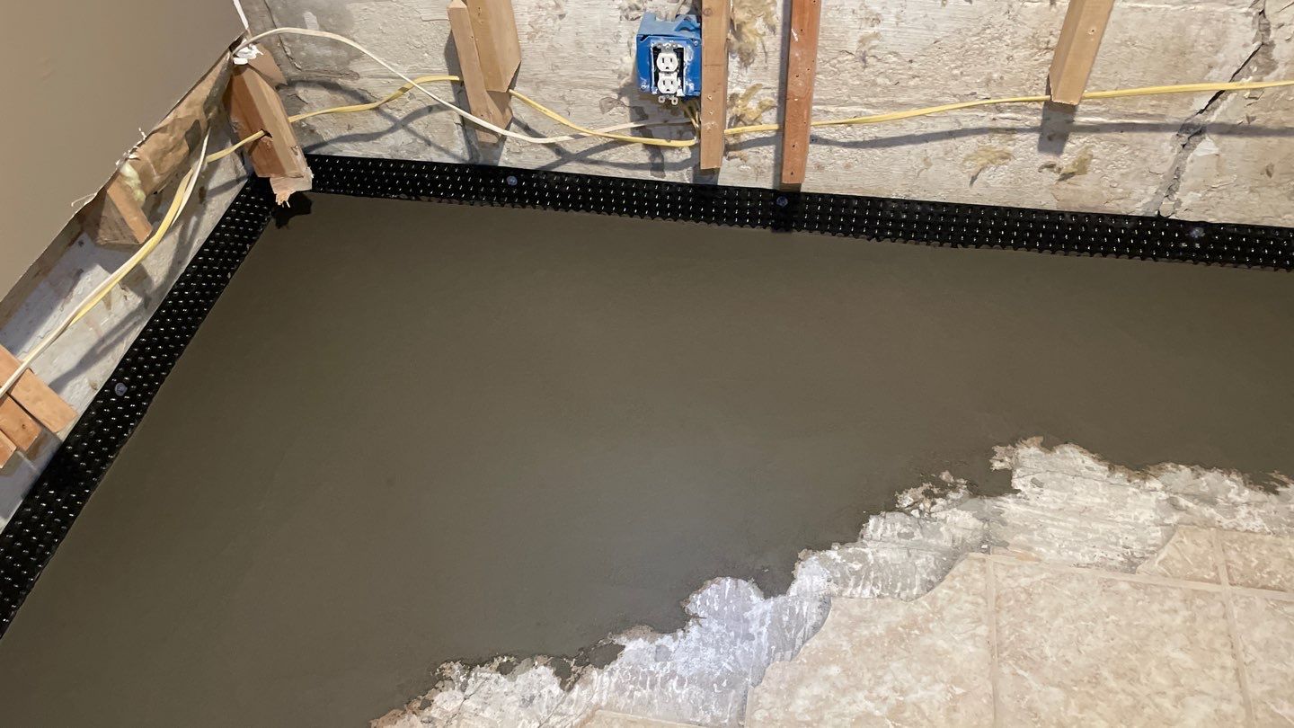 Drain Tile in Minneapolis for Kristen & Taylor by Waterproofing Northeast
