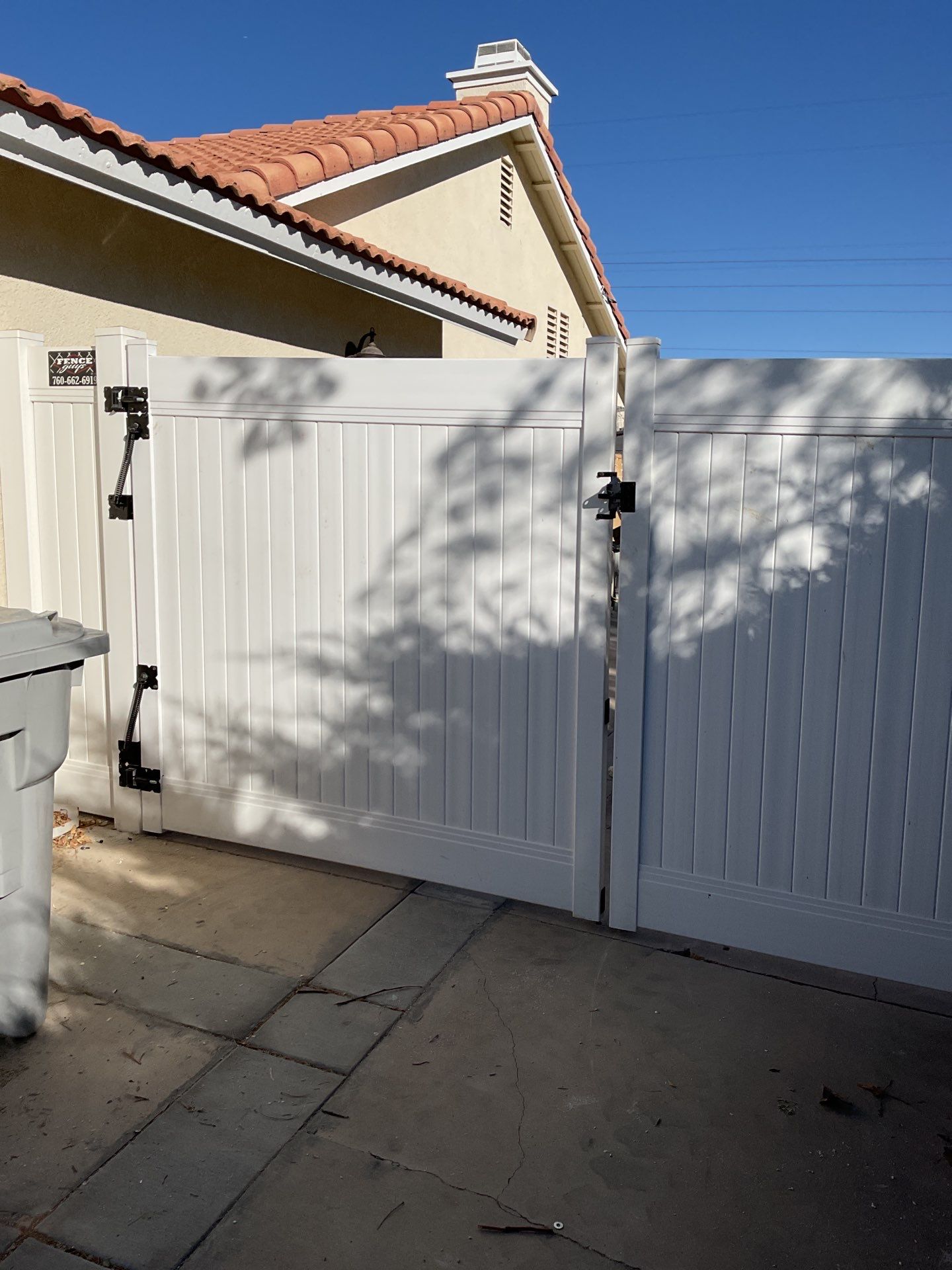 Gate installation using Vinyl by Fence Guys Inc. 