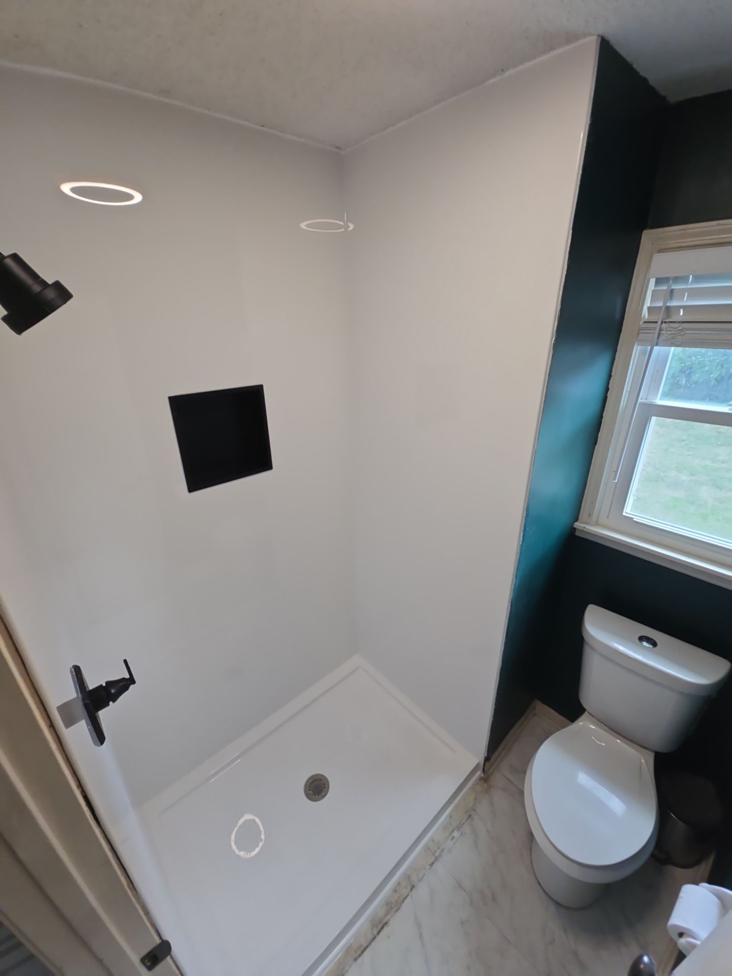 Tile out, Bella Stone in! by The Shower Company