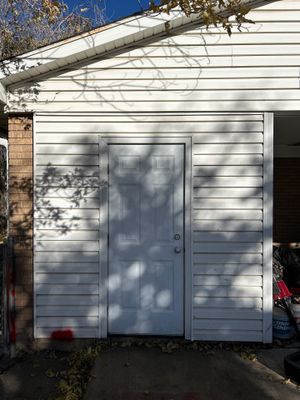 Salt Lake Area | Targeted Vinyl Siding & Door Trim Repair | Crisp White