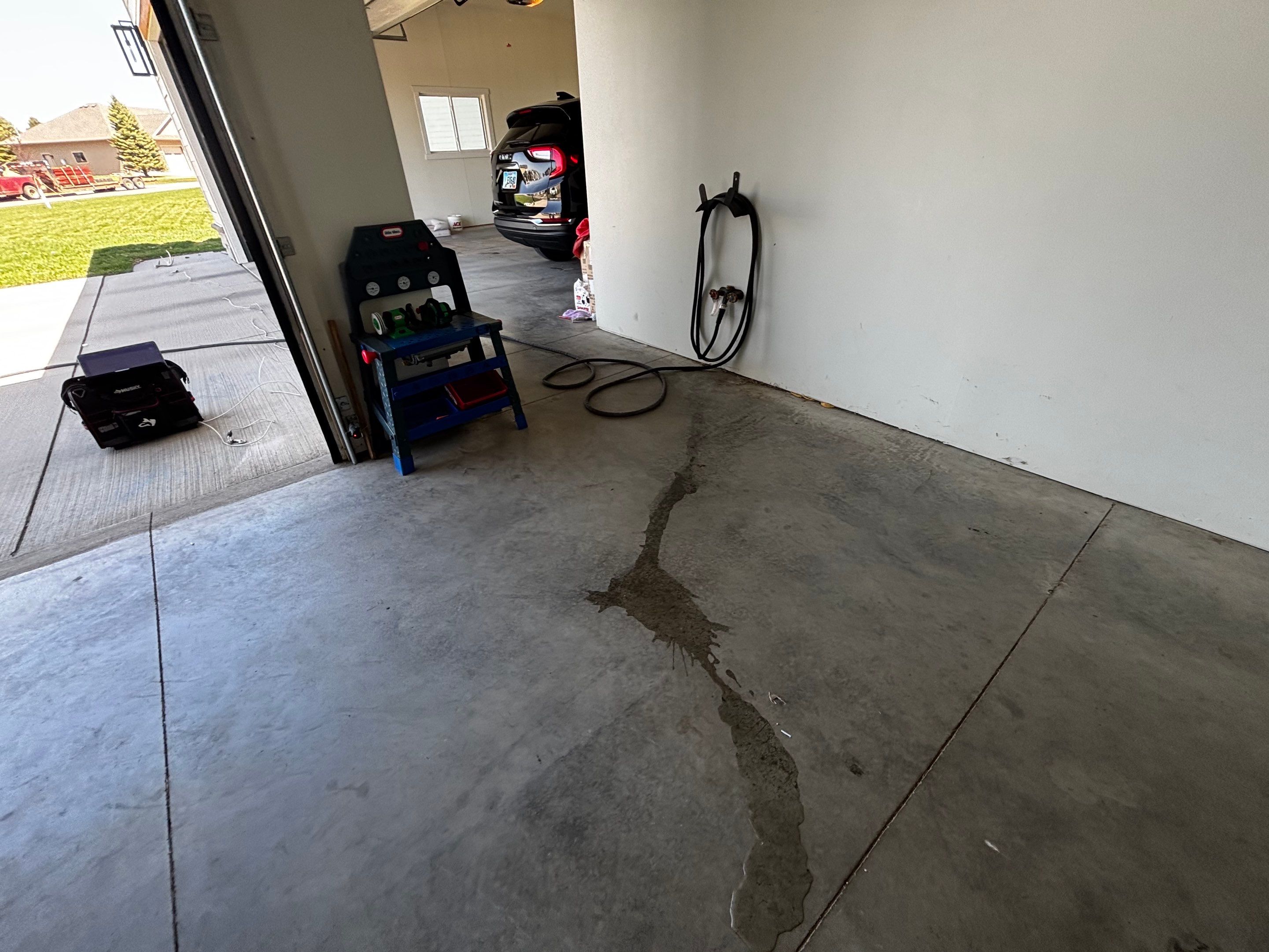 Dell Rapids Multi-Car Garage Concrete Floor Coating and Repair by Select Painting, Coatings & Garage Cabinets