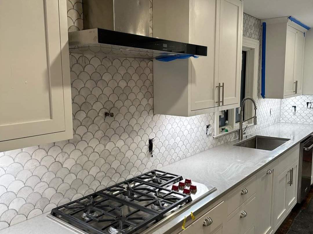Scallop Backsplash by Footprints Floors Morristown