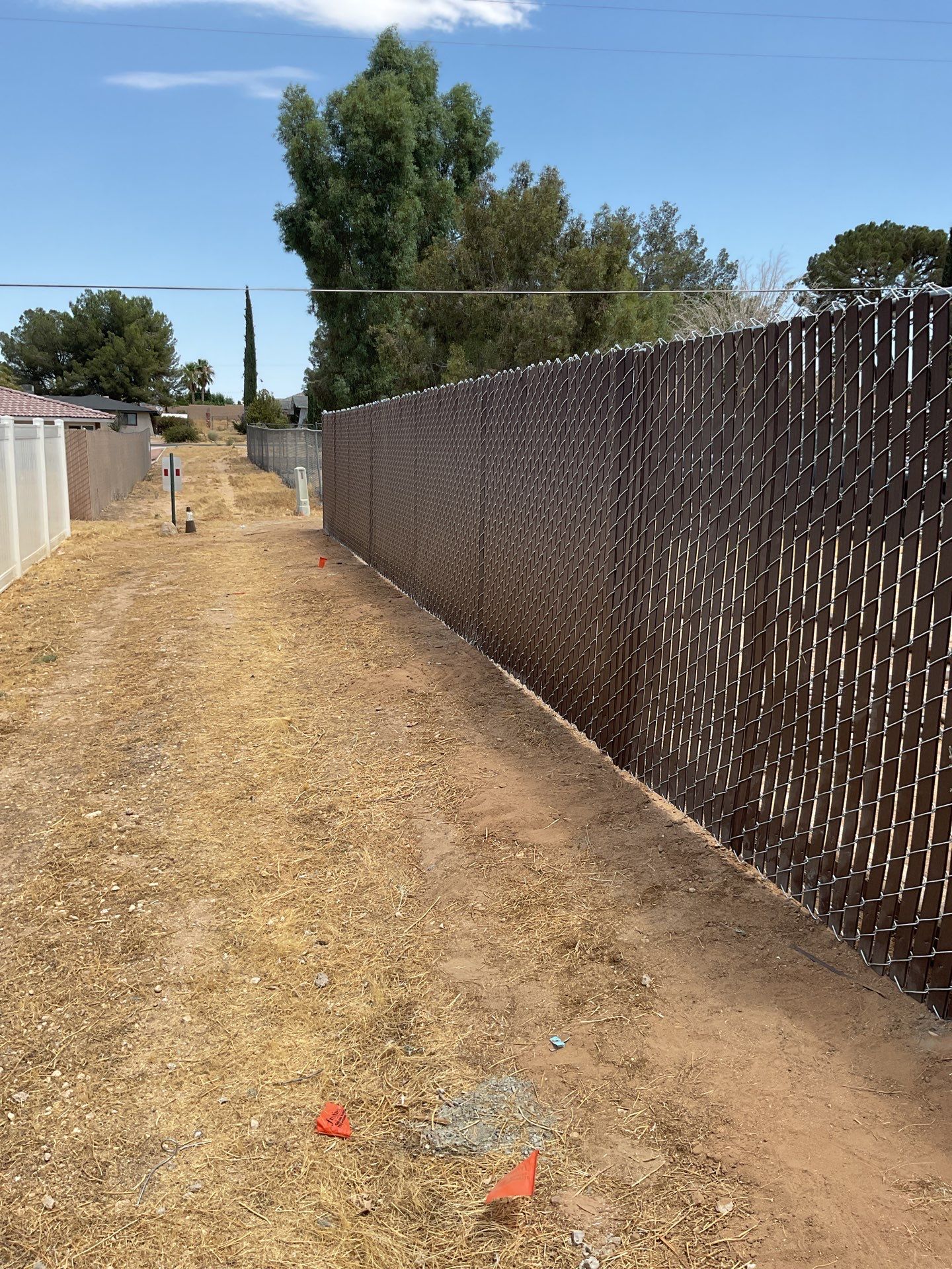 Dark Brown Privacy Chain Link Fence by Fence Guys Inc.