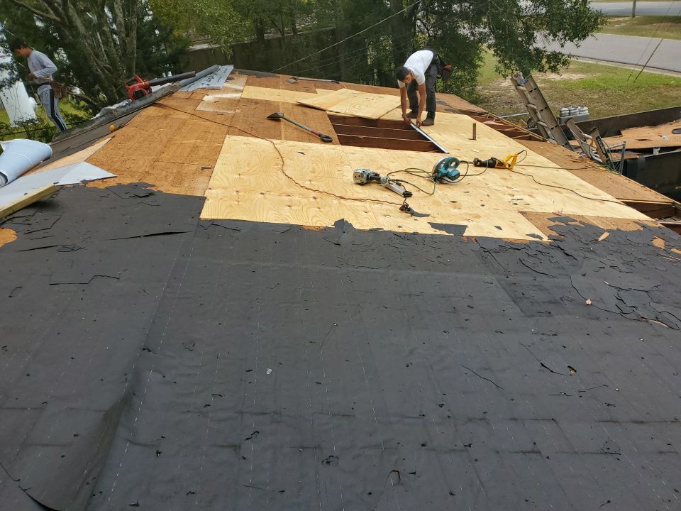 Residential Roofing Installation using Roof Replacement by American Roofing & Construction LLC